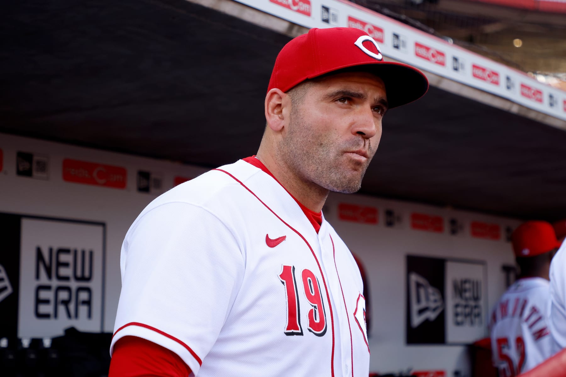 CINCINNATI, OH - JULY 29:  Joey Votto #19 of the Cincinnati Reds stands in the dugout prior to the start of the game against the Baltimore Orioles at Great American Ball Park on July 29, 2022 in Cincinnati, Ohio. (Photo by Kirk Irwin/Getty Images)