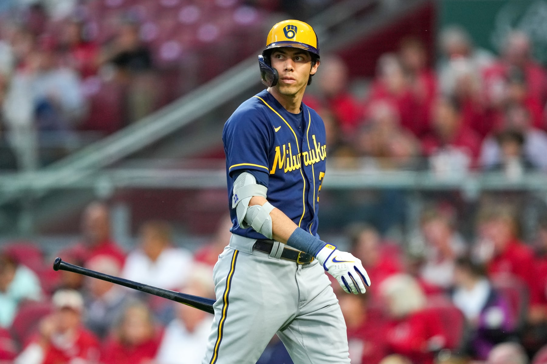 CINCINNATI, OHIO - SEPTEMBER 22: Christian Yelich #22 of the Milwaukee Brewers walks back to the dugout after striking out in the third inning against the Cincinnati Reds at Great American Ball Park on September 22, 2022 in Cincinnati, Ohio. (Photo by Dylan Buell/Getty Images)