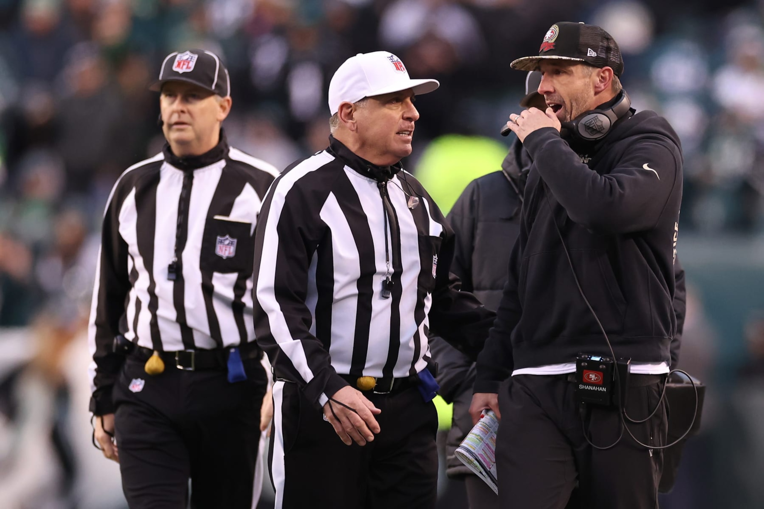 PHILADELPHIA, PENNSYLVANIA - JANUARY 29: Head coach Kyle Shanahan of San Francisco 49ers argues with referee John Hussey #35 against the Philadelphia Eagles during the second quarter in the NFC Championship Game at Lincoln Financial Field on January 29, 2023 in Philadelphia, Pennsylvania. (Photo by Tim Nwachukwu/Getty Images)