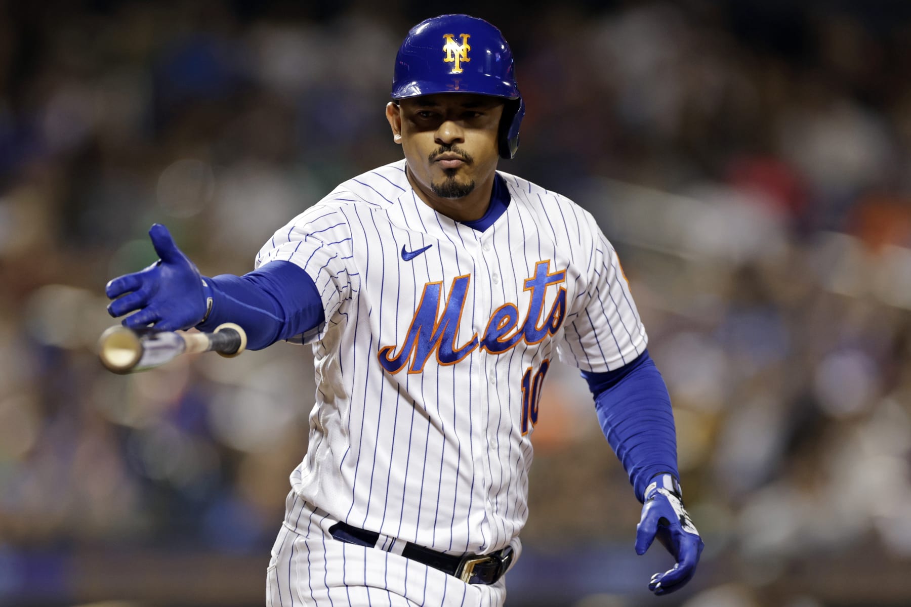 NEW YORK, NY - SEPTEMBER 17: Eduardo Escobar #10 of the New York Mets drops his bat after being walked during the sixth inning against the Pittsburgh Pirates at Citi Field on September 17, 2022 in the Queens borough of New York City. (Photo by Adam Hunger/Getty Images)