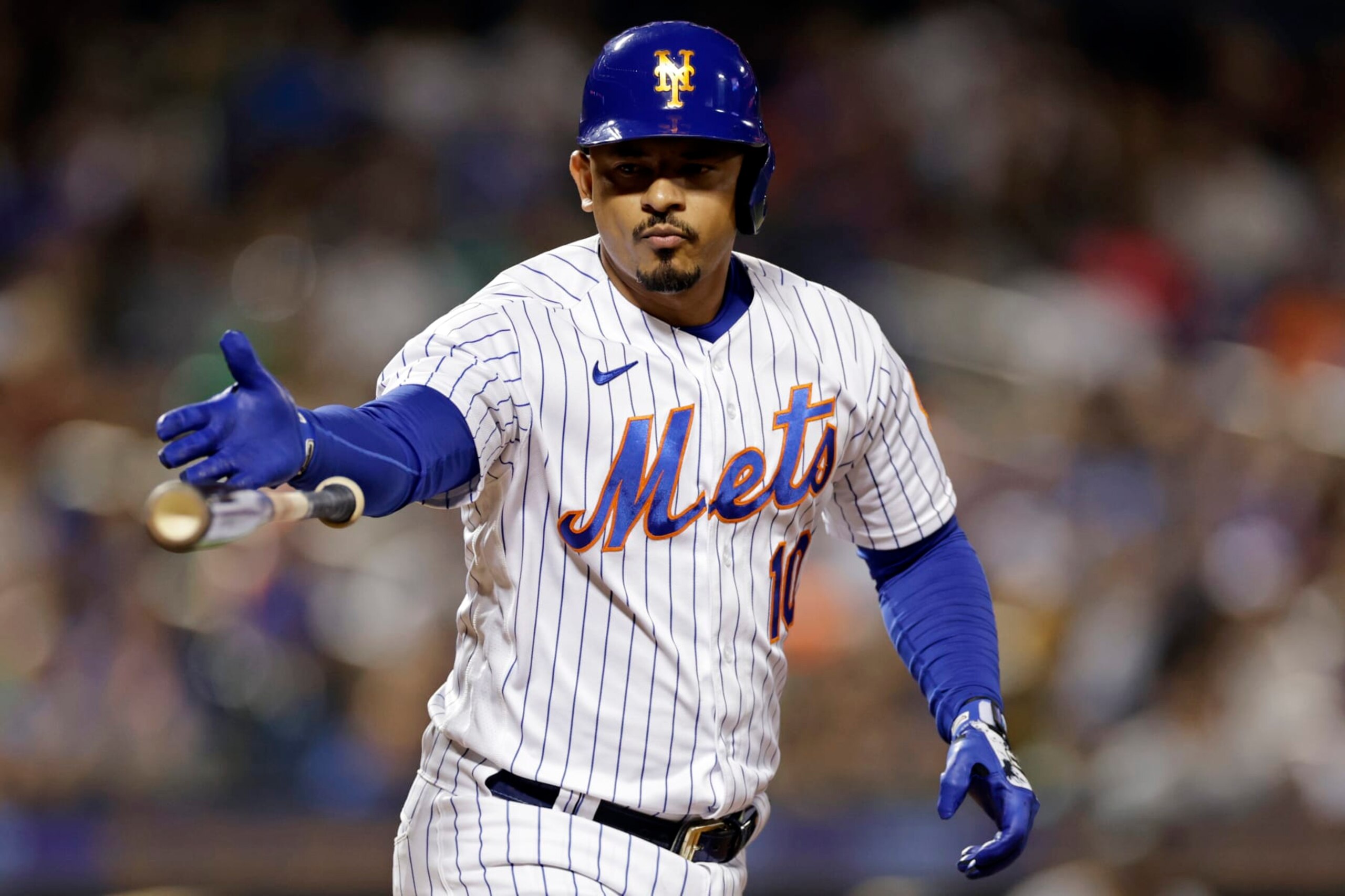 NEW YORK, NY - SEPTEMBER 17: Eduardo Escobar #10 of the New York Mets drops his bat after being walked during the sixth inning against the Pittsburgh Pirates at Citi Field on September 17, 2022 in the Queens borough of New York City. (Photo by Adam Hunger/Getty Images)