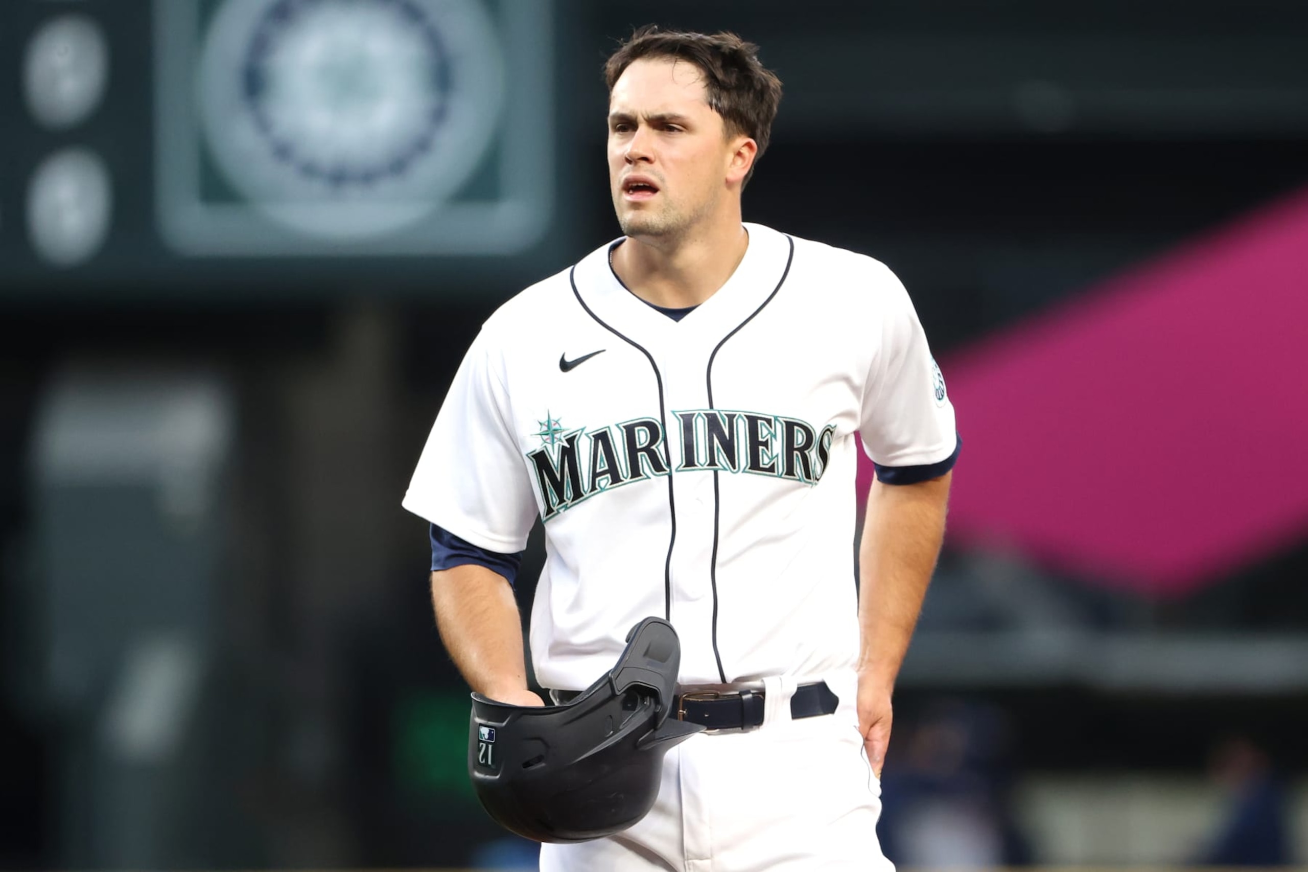 SEATTLE, WASHINGTON - APRIL 17: Evan White #12 of the Seattle Mariners reacts after the end of the fifth inning of the MLB game against the Houston Astros at T-Mobile Park on April 17, 2021 in Seattle, Washington. (Photo by Abbie Parr/Getty Images)