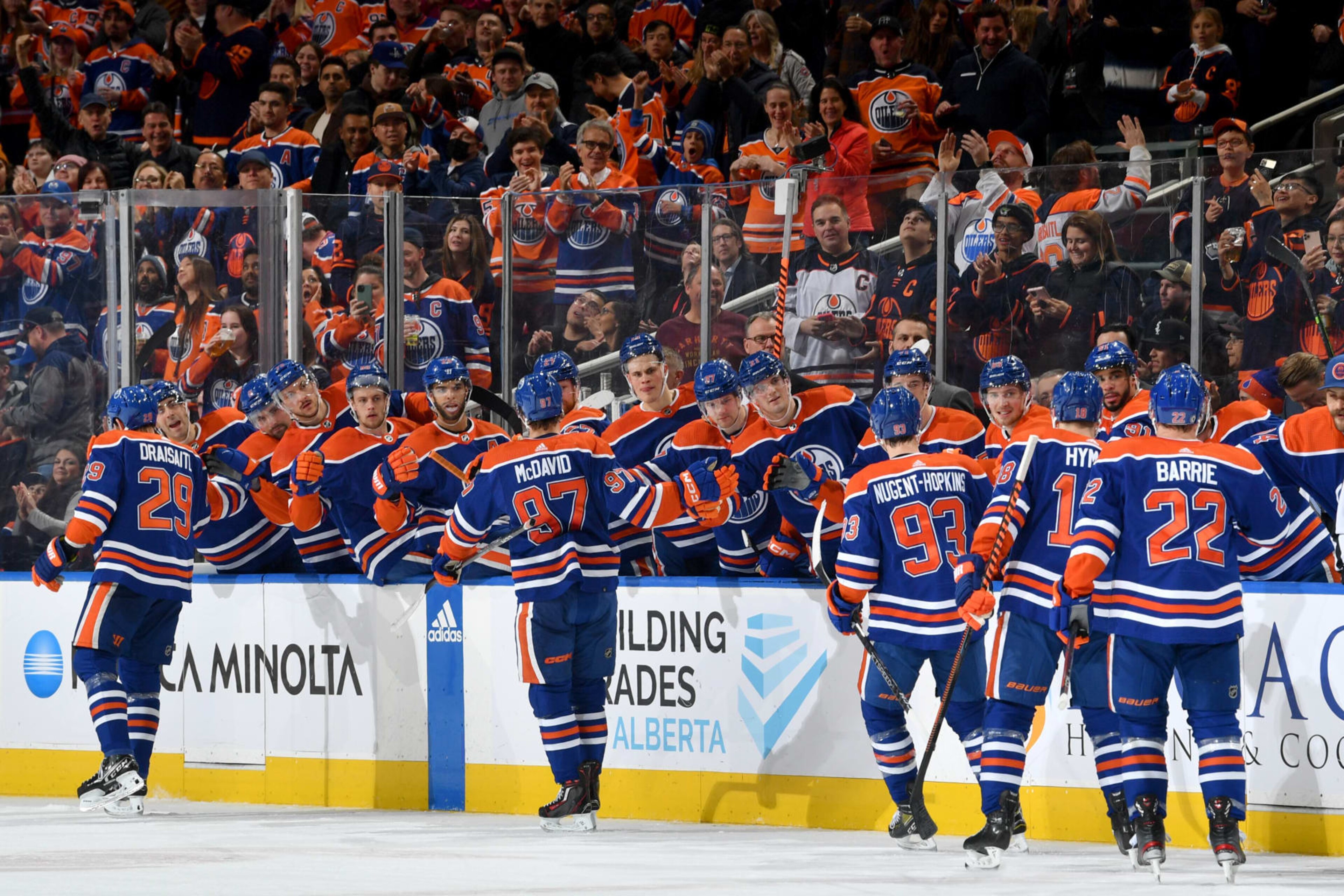EDMONTON, CANADA - JANUARY 19: Leon Draisaitl #29, Connor McDavid #97, Ryan Nugent-Hopkins #93, Zach Hyman #18 and Tyson Barrie #22 of the Edmonton Oilers celebrate after a first period goal against the Tampa Bay Lightning at the bench during the game on January 19, 2023 at Rogers Place in Edmonton, Alberta, Canada. (Photo by Andy Devlin/NHLI via Getty Images) EDMONTON, CANADA - JANUARY 19: Leon Draisaitl #29, Connor McDavid #97, Ryan Nugent-Hopkins #93, Zach Hyman #18 and Tyson Barrie #22 of the Edmonton Oilers celebrate after a first period goal against the Tampa Bay Lightning at the bench during the game on January 19, 2023 at Rogers Place in Edmonton, Alberta, Canada. (Photo by Andy Devlin/NHLI via Getty Images)