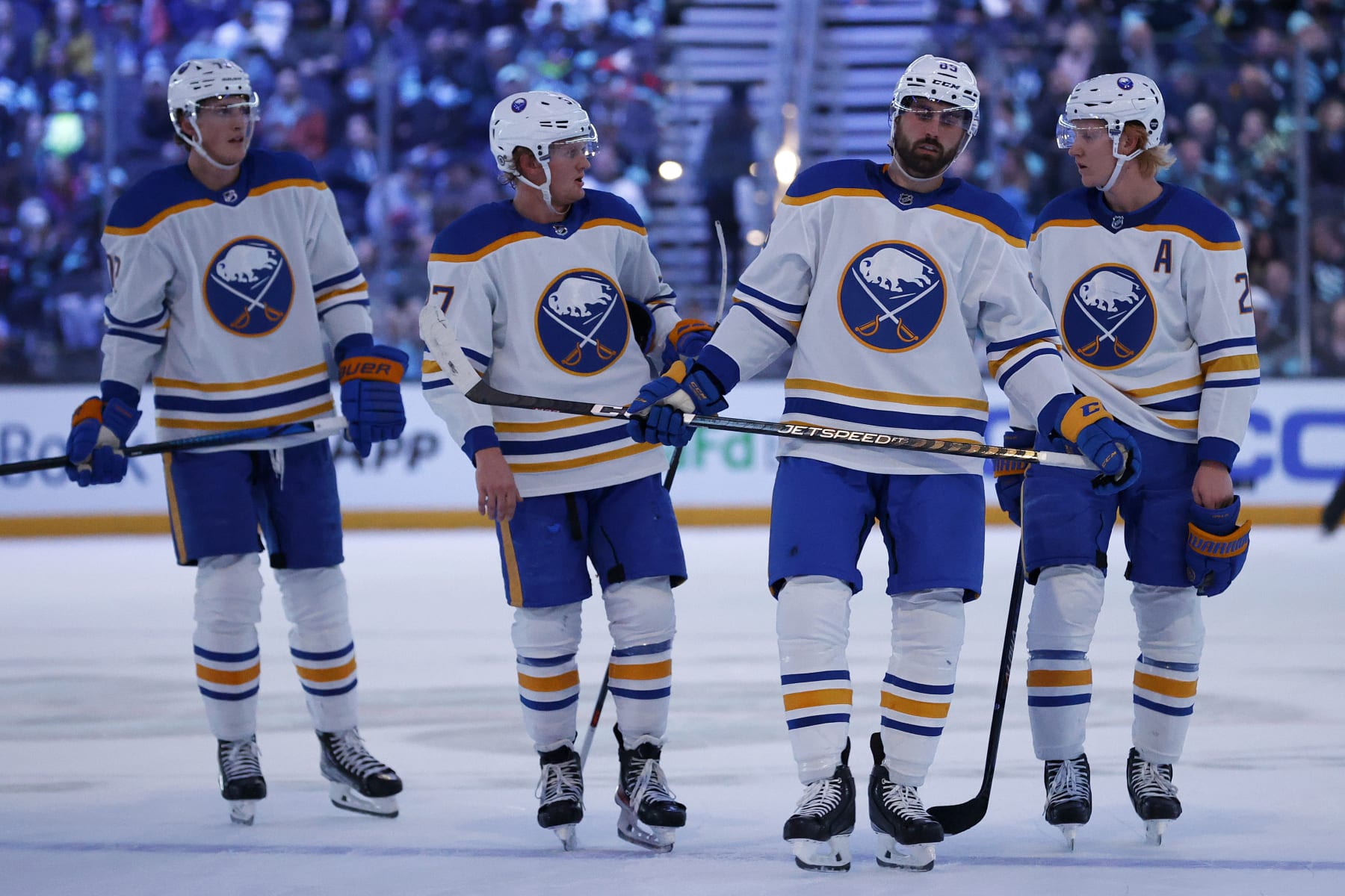 SEATTLE, WASHINGTON - OCTOBER 25: Tage Thompson #72, Casey Mittelstadt #37, Alex Tuch #89 and Rasmus Dahlin #26 of the Buffalo Sabres look on against the Seattle Kraken during the first period at Climate Pledge Arena on October 25, 2022 in Seattle, Washington. (Photo by Steph Chambers/Getty Images)