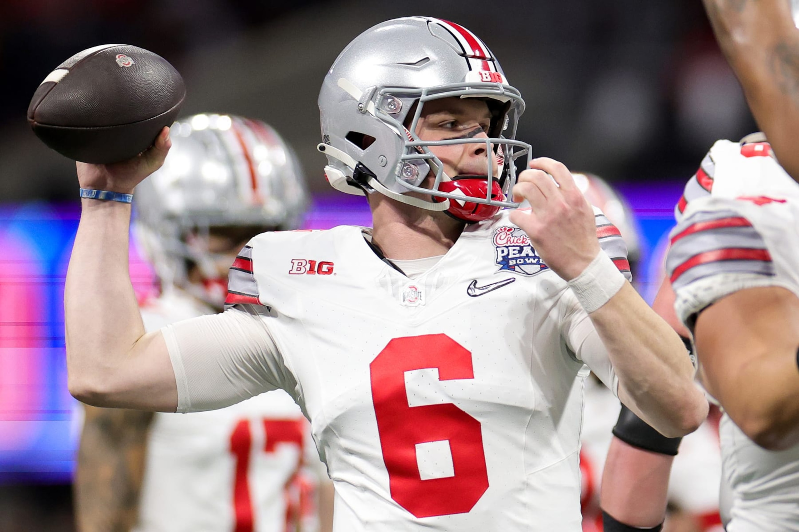 ATLANTA, GEORGIA - DECEMBER 31: Kyle McCord #6 of the Ohio State Buckeyes warms up prior to the game against the Georgia Bulldogs in the Chick-fil-A Peach Bowl at Mercedes-Benz Stadium on December 31, 2022 in Atlanta, Georgia. (Photo by Carmen Mandato/Getty Images)