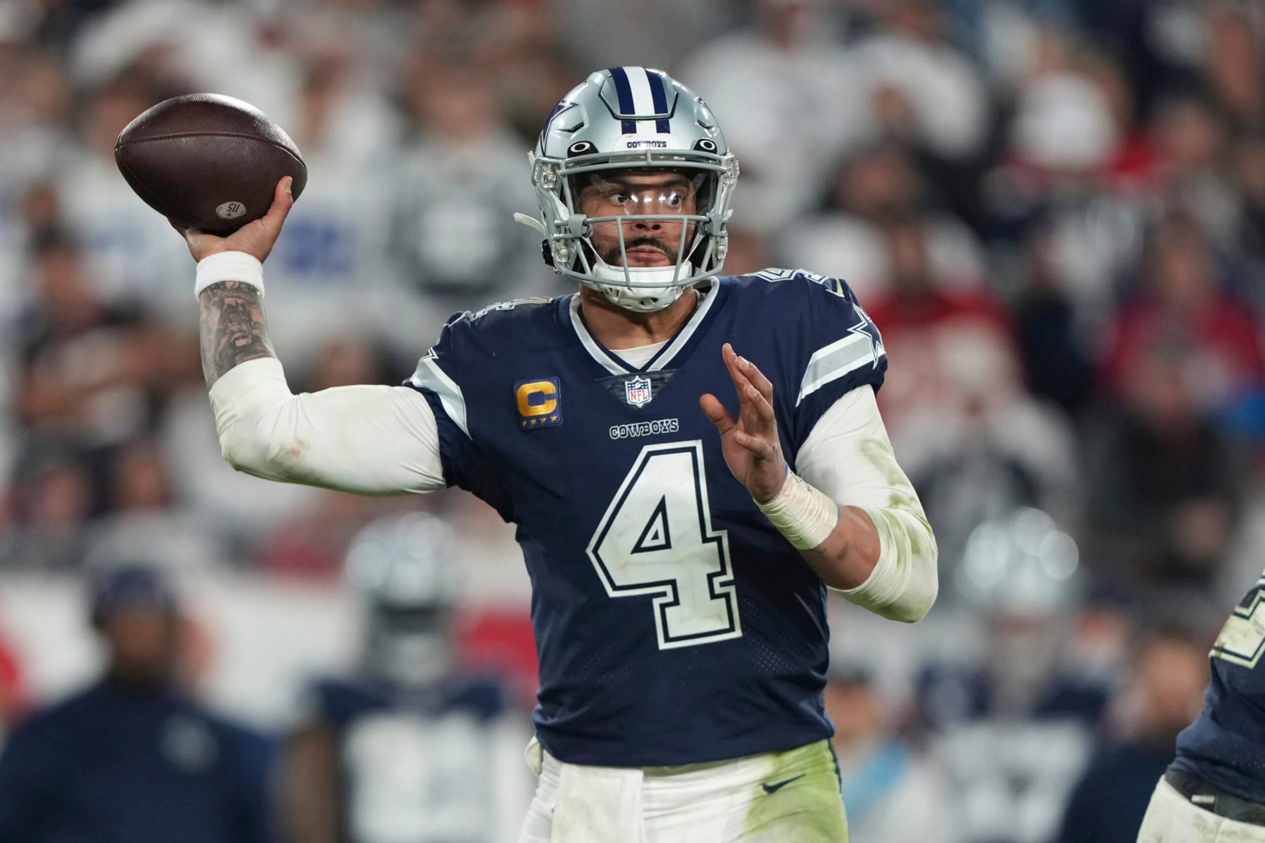 Dallas Cowboys quarterback Dak Prescott (4) makes a pass attempt in the second half during an NFL wild-card football game against the Tampa Bay Buccaneers, Monday, Jan. 16, 2023, in Tampa, Fla. (AP Photo/Peter Joneleit)