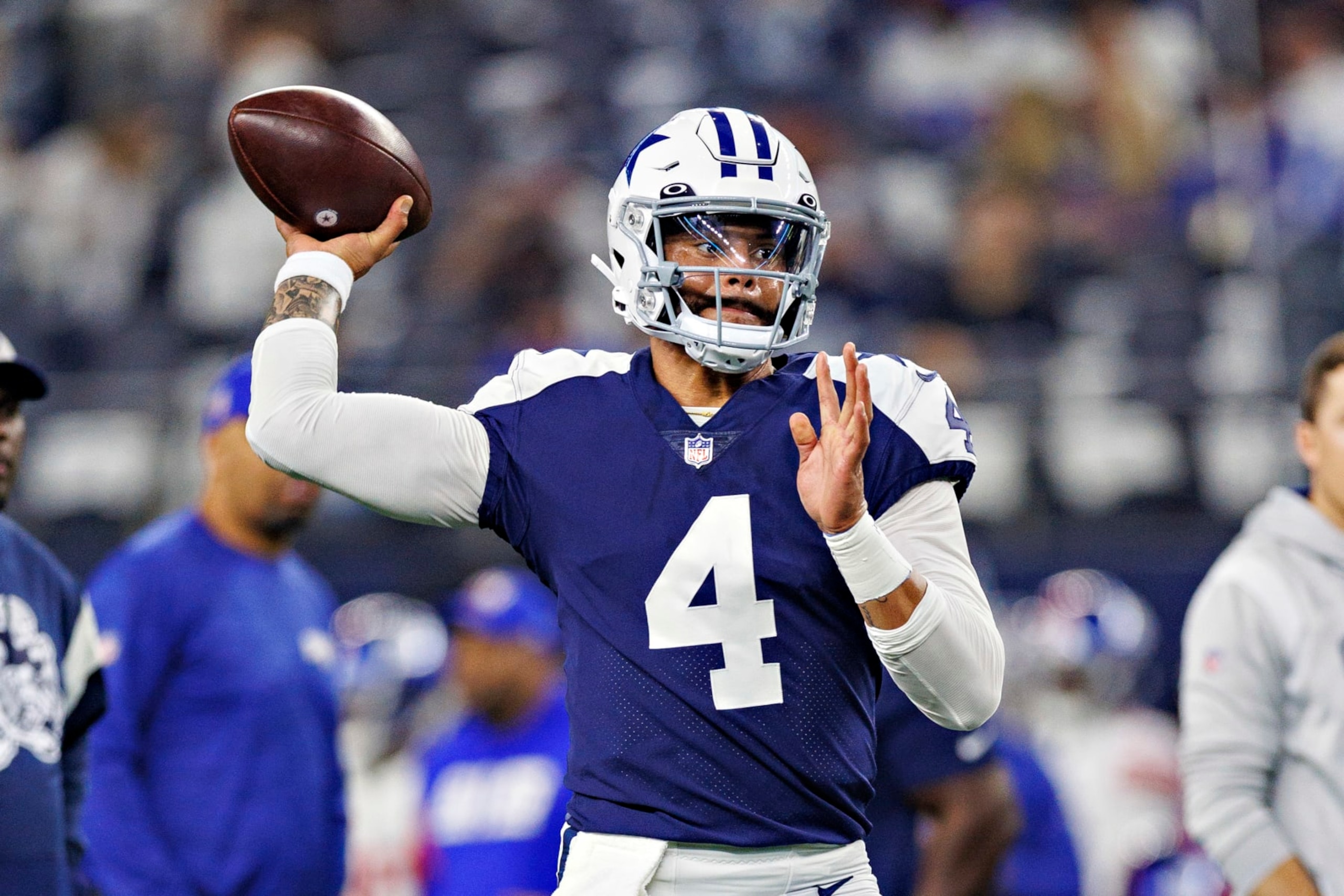 ARLINGTON, TEXAS - NOVEMBER 24:  Dak Prescott #4 of the Dallas Cowboys warms up before a game against the New York Giants at AT&T Stadium on November 24, 2022 in Arlington, Texas. The Cowboys defeated the Giants 28-20. (Photo by Wesley Hitt/Getty Images)