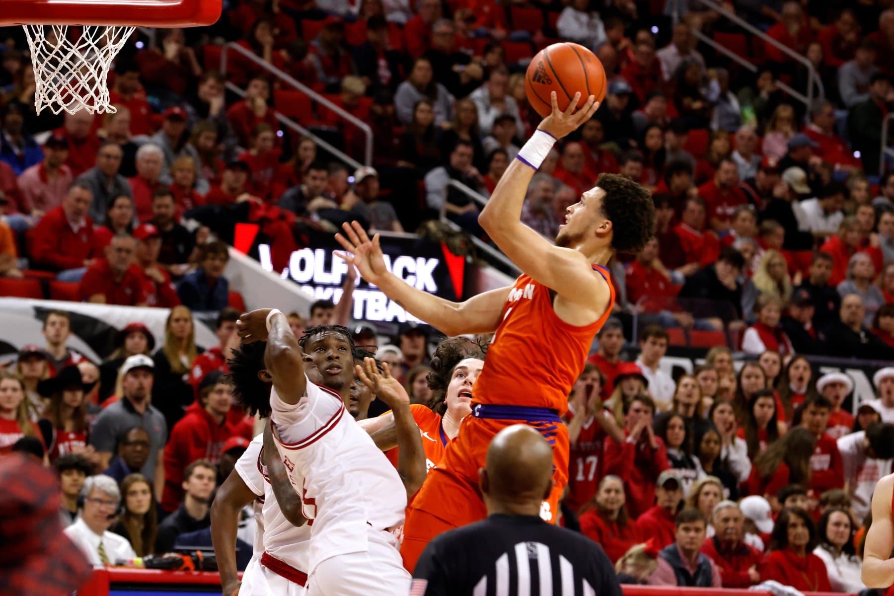 RALEIGH, NC - FEBRUARY 25: Chase Hunter #1 of the Clemson Tigers goes to the basket against the NC State Wolfpack at PNC Arena on February 25, 2023 in Raleigh, North Carolina. Clemson won 96-71. (Photo by Lance King/Getty Images)