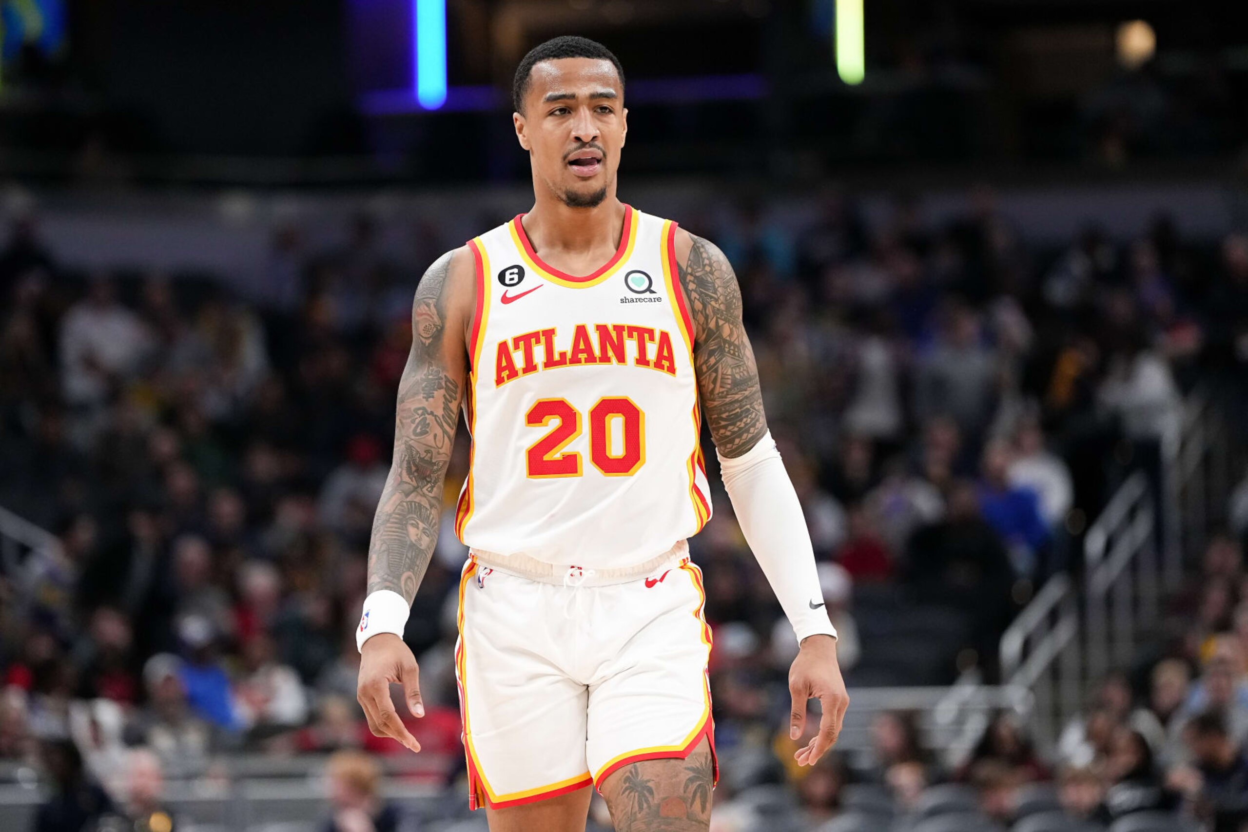INDIANAPOLIS, INDIANA - DECEMBER 27: John Collins #20 of the Atlanta Hawks walks across the court in the third quarter against the Indiana Pacers at Gainbridge Fieldhouse on December 27, 2022 in Indianapolis, Indiana. NOTE TO USER: User expressly acknowledges and agrees that, by downloading and or using this photograph, User is consenting to the terms and conditions of the Getty Images License Agreement. (Photo by Dylan Buell/Getty Images) INDIANAPOLIS, INDIANA - DECEMBER 27: John Collins #20 of the Atlanta Hawks walks across the court in the third quarter against the Indiana Pacers at Gainbridge Fieldhouse on December 27, 2022 in Indianapolis, Indiana. NOTE TO USER: User expressly acknowledges and agrees that, by downloading and or using this photograph, User is consenting to the terms and conditions of the Getty Images License Agreement. (Photo by Dylan Buell/Getty Images)