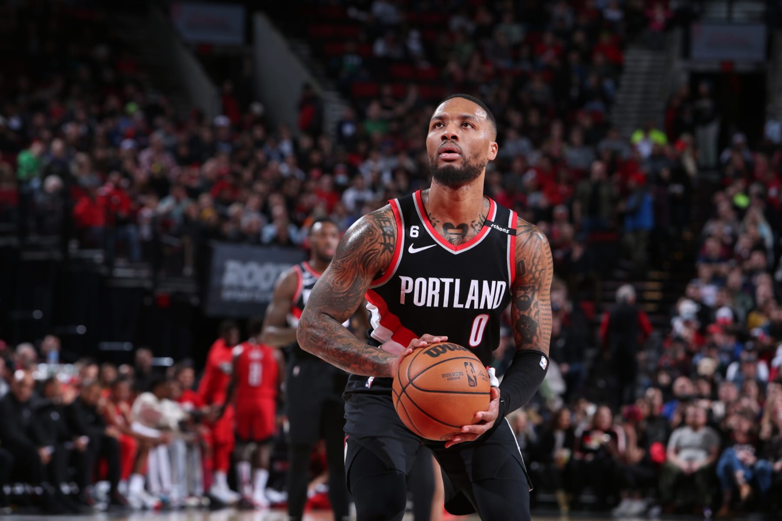 PORTLAND, OR - FEBRUARY 26: Damian Lillard #0 of the Portland Trail Blazers shoots a free throw during the game on February 26, 2023 at the Moda Center Arena in Portland, Oregon. NOTE TO USER: User expressly acknowledges and agrees that, by downloading and or using this photograph, user is consenting to the terms and conditions of the Getty Images License Agreement. Mandatory Copyright Notice: Copyright 2023 NBAE (Photo by Sam Forencich/NBAE via Getty Images) PORTLAND, OR - FEBRUARY 26: Damian Lillard #0 of the Portland Trail Blazers shoots a free throw during the game on February 26, 2023 at the Moda Center Arena in Portland, Oregon. NOTE TO USER: User expressly acknowledges and agrees that, by downloading and or using this photograph, user is consenting to the terms and conditions of the Getty Images License Agreement. Mandatory Copyright Notice: Copyright 2023 NBAE (Photo by Sam Forencich/NBAE via Getty Images)