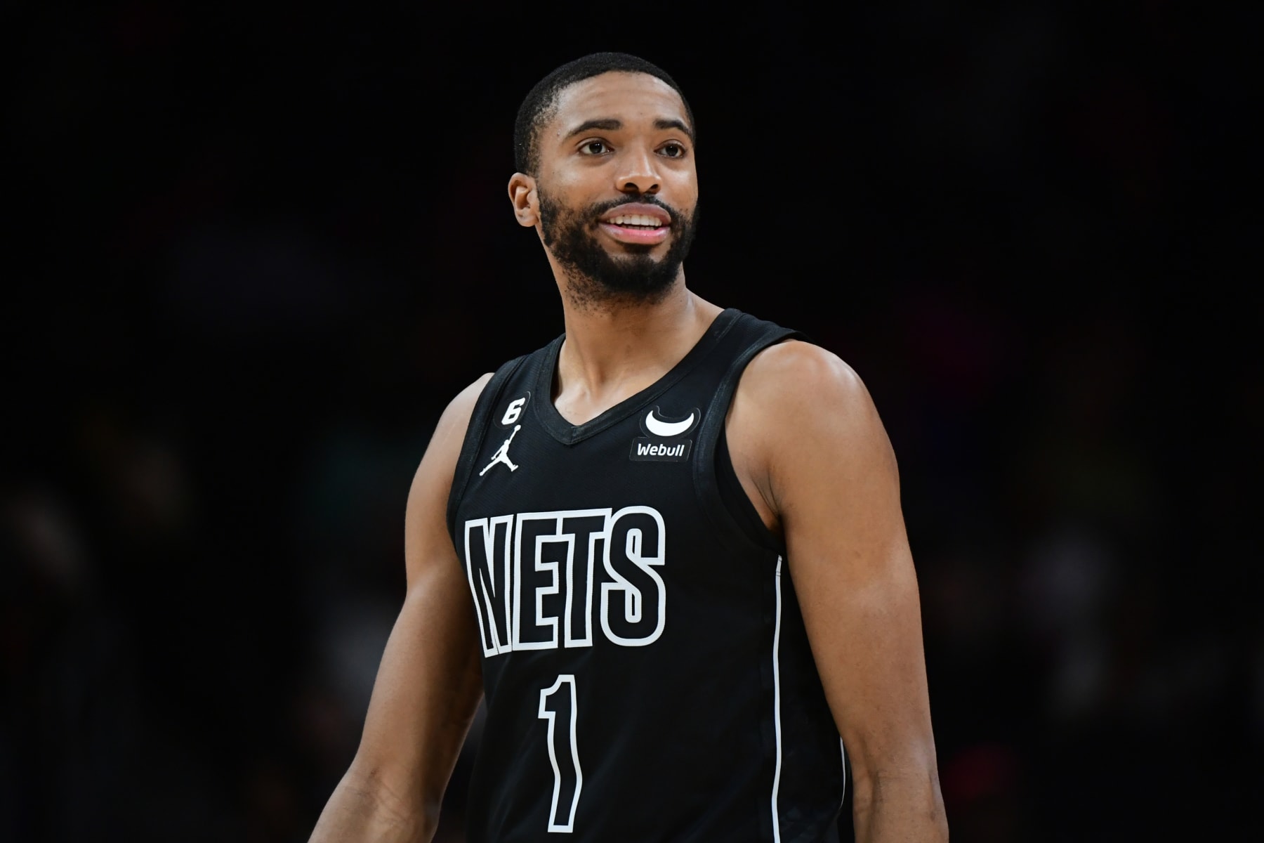 ATLANTA, GA - FEBRUARY 26: Mikal Bridges #1 of the Brooklyn Nets smiles during the game against the Atlanta Hawks on February 26, 2023 at State Farm Arena in Atlanta, Georgia.  NOTE TO USER: User expressly acknowledges and agrees that, by downloading and/or using this Photograph, user is consenting to the terms and conditions of the Getty Images License Agreement. Mandatory Copyright Notice: Copyright 2023 NBAE (Photo by Adam Hagy/NBAE via Getty Images)