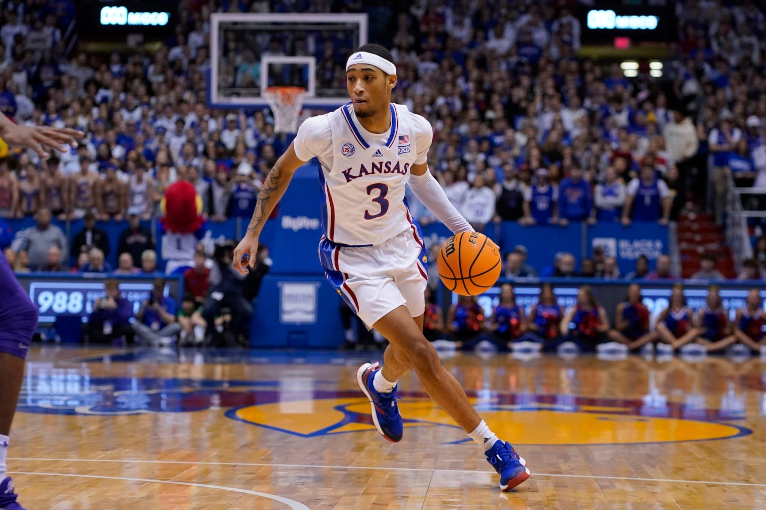 LAWRENCE, KS - JANUARY 31: Dajuan Harris Jr. #3 of the Kansas Jayhawks in action during the game against the Kansas State Wildcats at Allen Fieldhouse on January 31, 2023 in Lawrence, Kansas. (Photo by Ed Zurga/Getty Images)