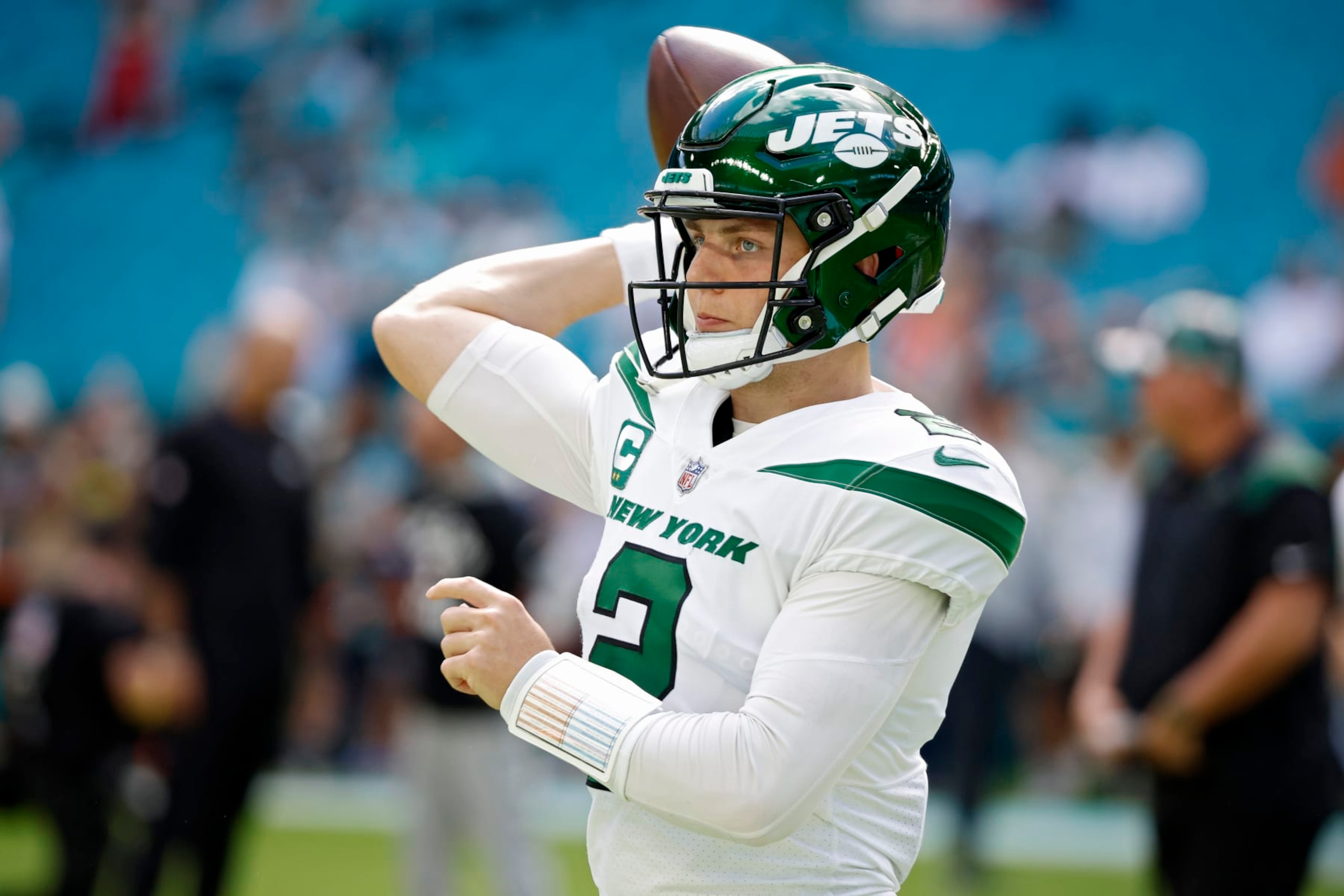 MIAMI GARDENS, FLORIDA - JANUARY 08: Zach Wilson #2 of the New York Jets warms up prior to a game against the Miami Dolphins at Hard Rock Stadium on January 08, 2023 in Miami Gardens, Florida. (Photo by Cliff Hawkins/Getty Images)