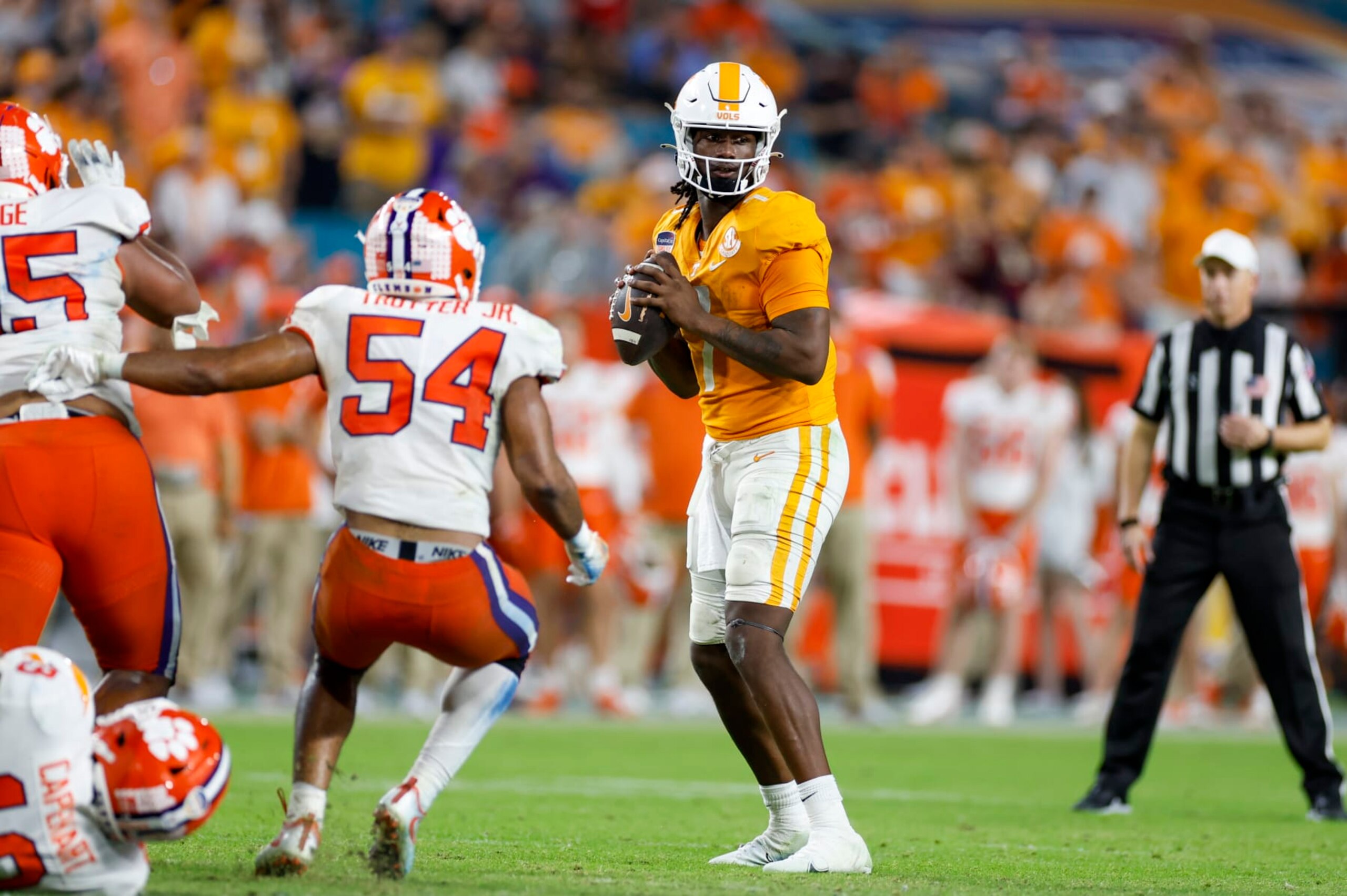 MIAMI GARDENS, FL - DECEMBER 30: Tennessee Volunteers quarterback Joe Milton III (7) throws a pass during the Capital One Orange Bowl between the Tennessee Volunteers and the Clemson Tigers on December 30, 2022 at Hard Rock Stadium in Miami Gardens, Fl. (Photo by David Rosenblum/Icon Sportswire via Getty Images)