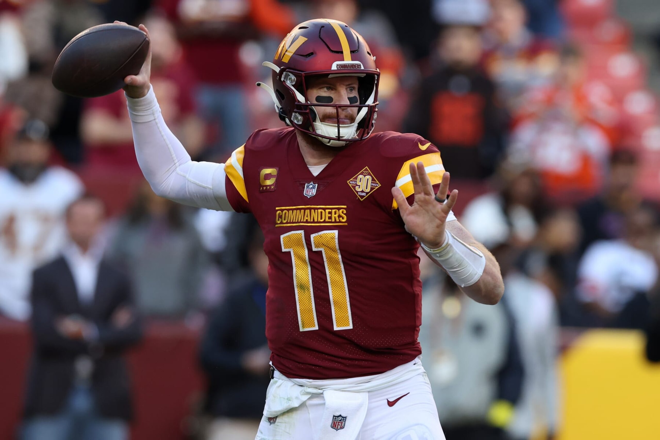 LANDOVER, MARYLAND - JANUARY 01: Carson Wentz #11 of the Washington Commanders throws a pass during the second half against the Cleveland Browns at FedExField on January 01, 2023 in Landover, Maryland. (Photo by Todd Olszewski/Getty Images)