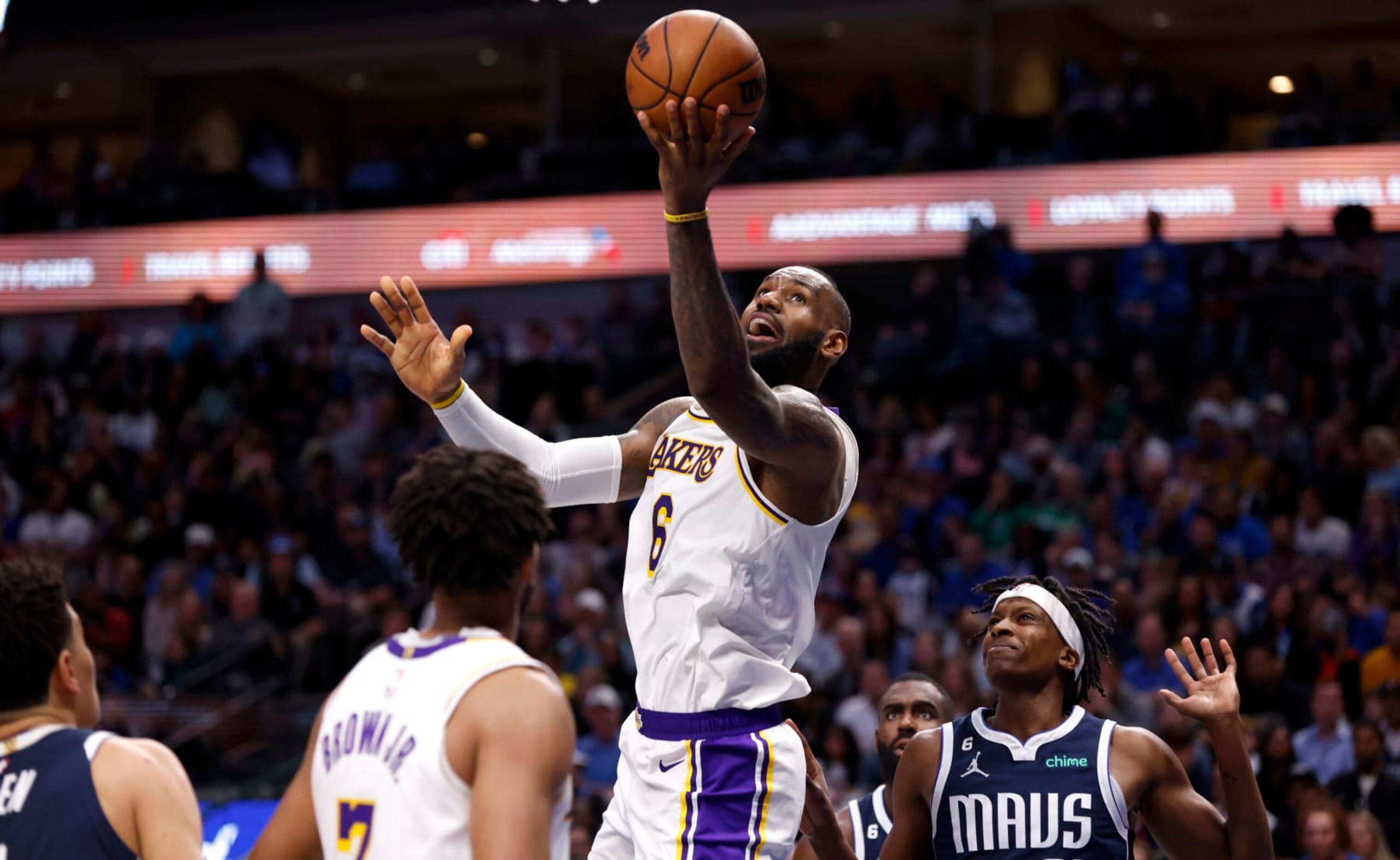 DALLAS, TX - FEBRUARY 26 : LeBron James #6 of the Los Angeles Lakers puts up a shot and scores against the Dallas Mavericks in the second half at American Airlines Center on February 26, 2023 in Dallas, Texas. The Lakers won 111-108. NOTE TO USER: User expressly acknowledges and agrees that, by downloading and or using this photograph, User is consenting to the terms and conditions of the Getty Images License Agreement. (Photo by Ron Jenkins/Getty Images)