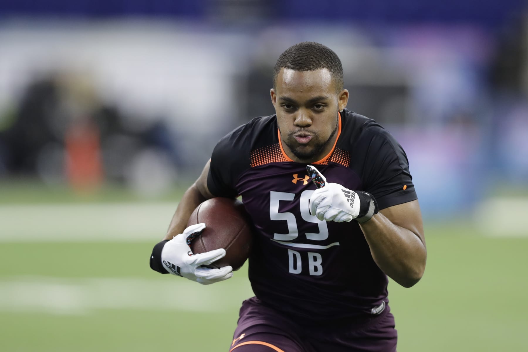 Virginia defensive back Juan Thornhill runs a drill during the NFL football scouting combine, Monday, March 4, 2019, in Indianapolis. (AP Photo/Darron Cummings)