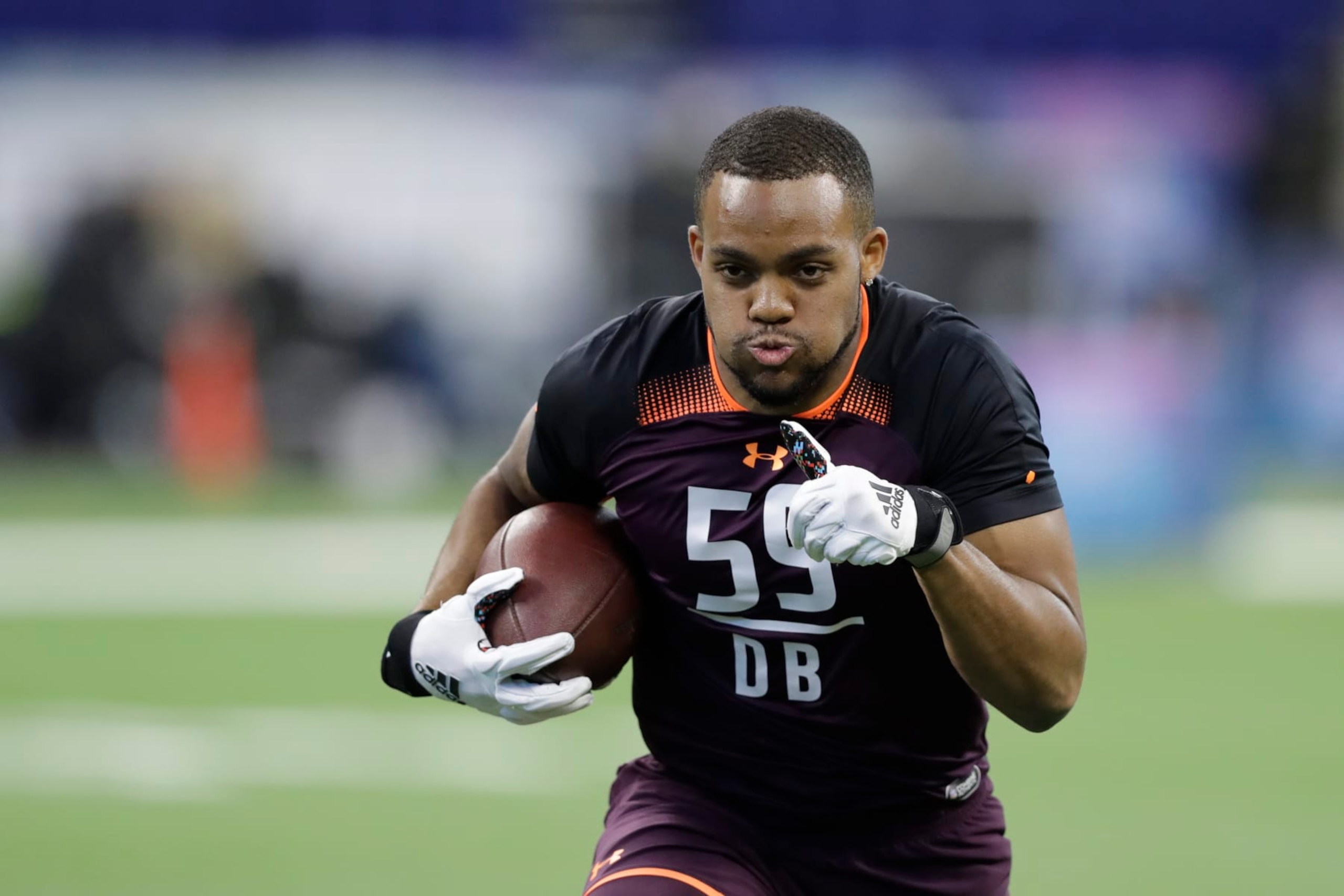 Virginia defensive back Juan Thornhill runs a drill during the NFL football scouting combine, Monday, March 4, 2019, in Indianapolis. (AP Photo/Darron Cummings)