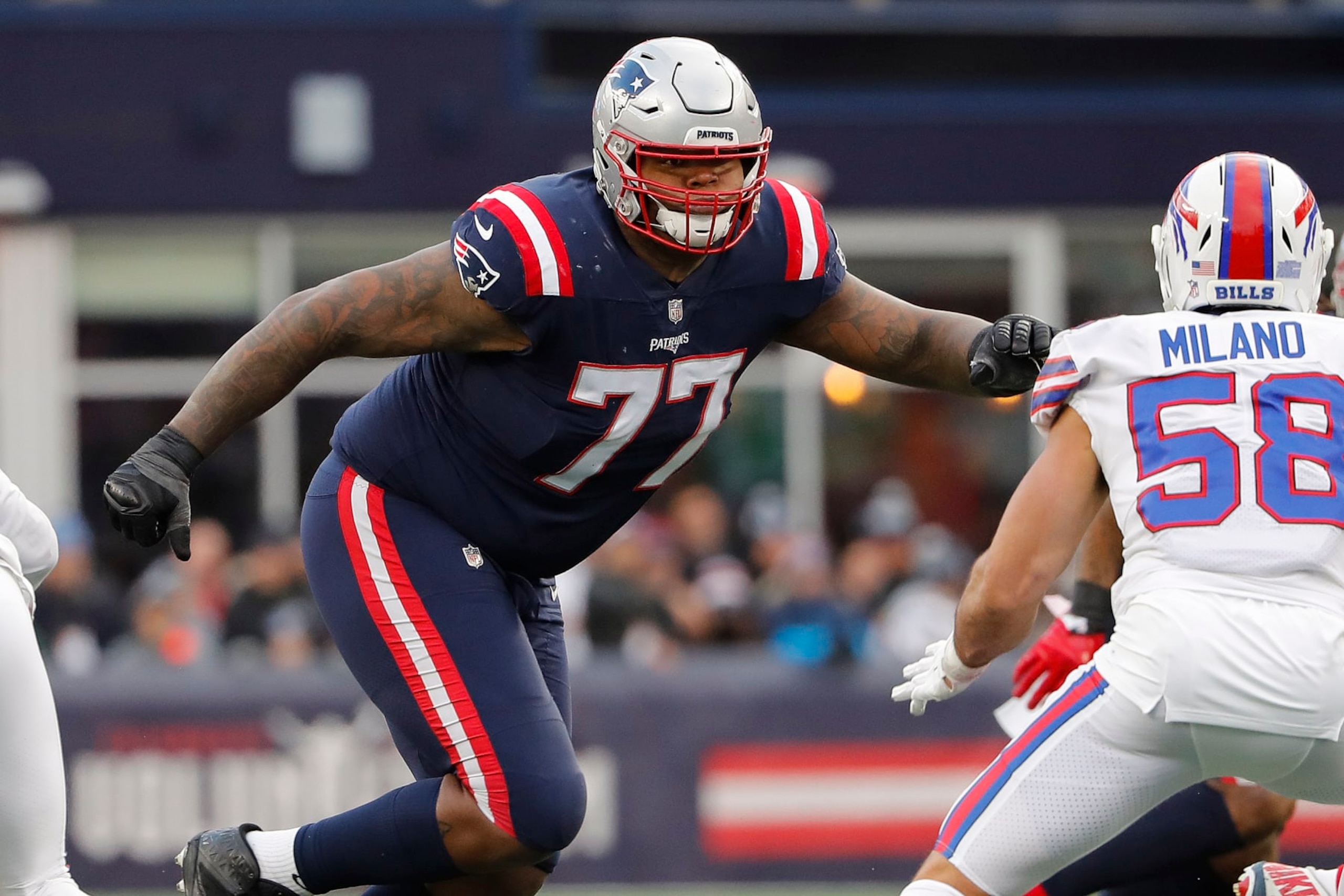 New England Patriots offensive tackle Trent Brown moves to block against the Buffalo Bills during an NFL football game at Gillette Stadium Sunday, Dec. 26, 2021, in Foxborough, Mass. (AP Photo/Winslow Townson)
