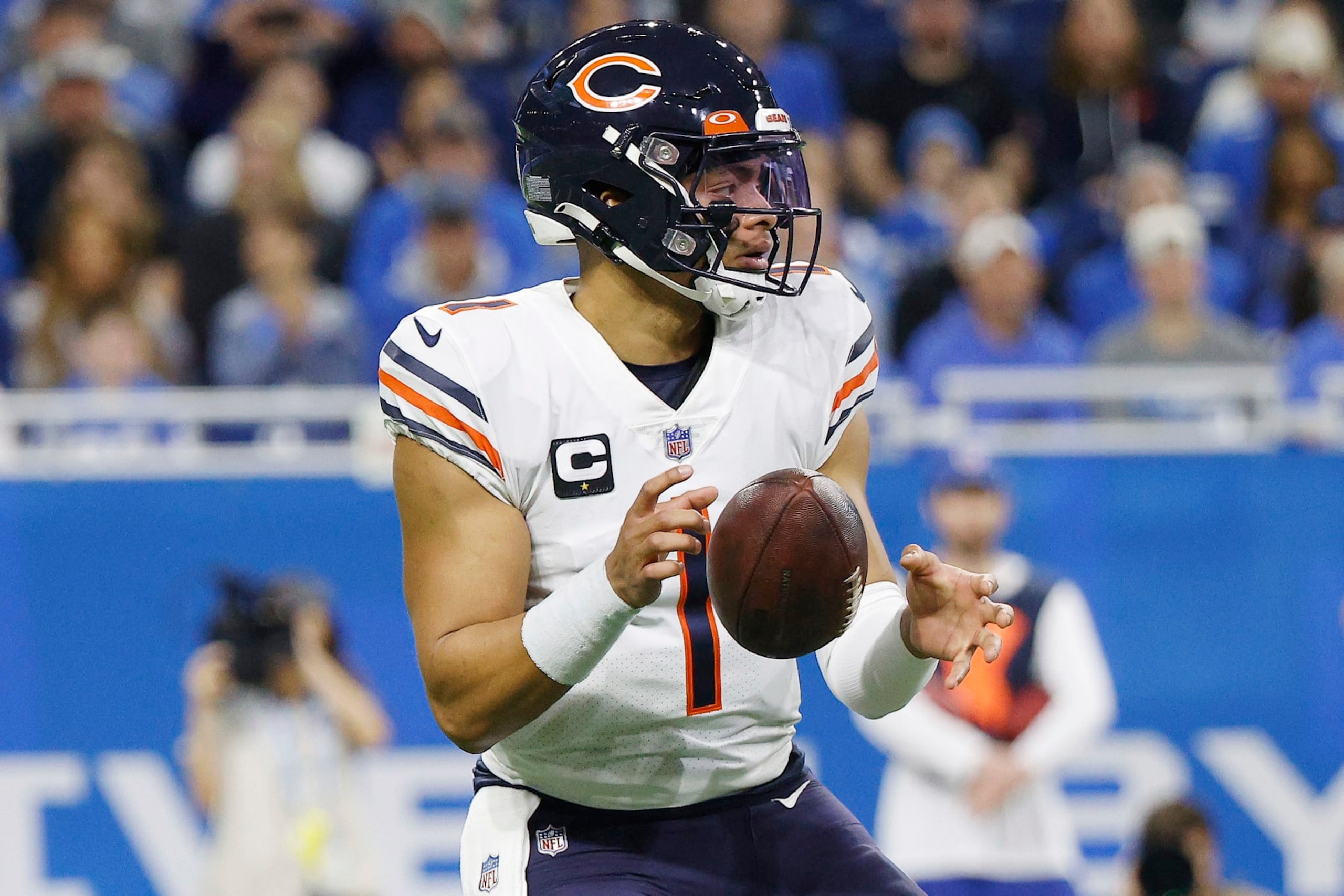 DETROIT, MICHIGAN - JANUARY 01: Justin Fields #1 of the Chicago Beats looks to throw a pass in the first half of a game against the Detroit Lions at Ford Field on January 01, 2023 in Detroit, Michigan. (Photo by Mike Mulholland/Getty Images)