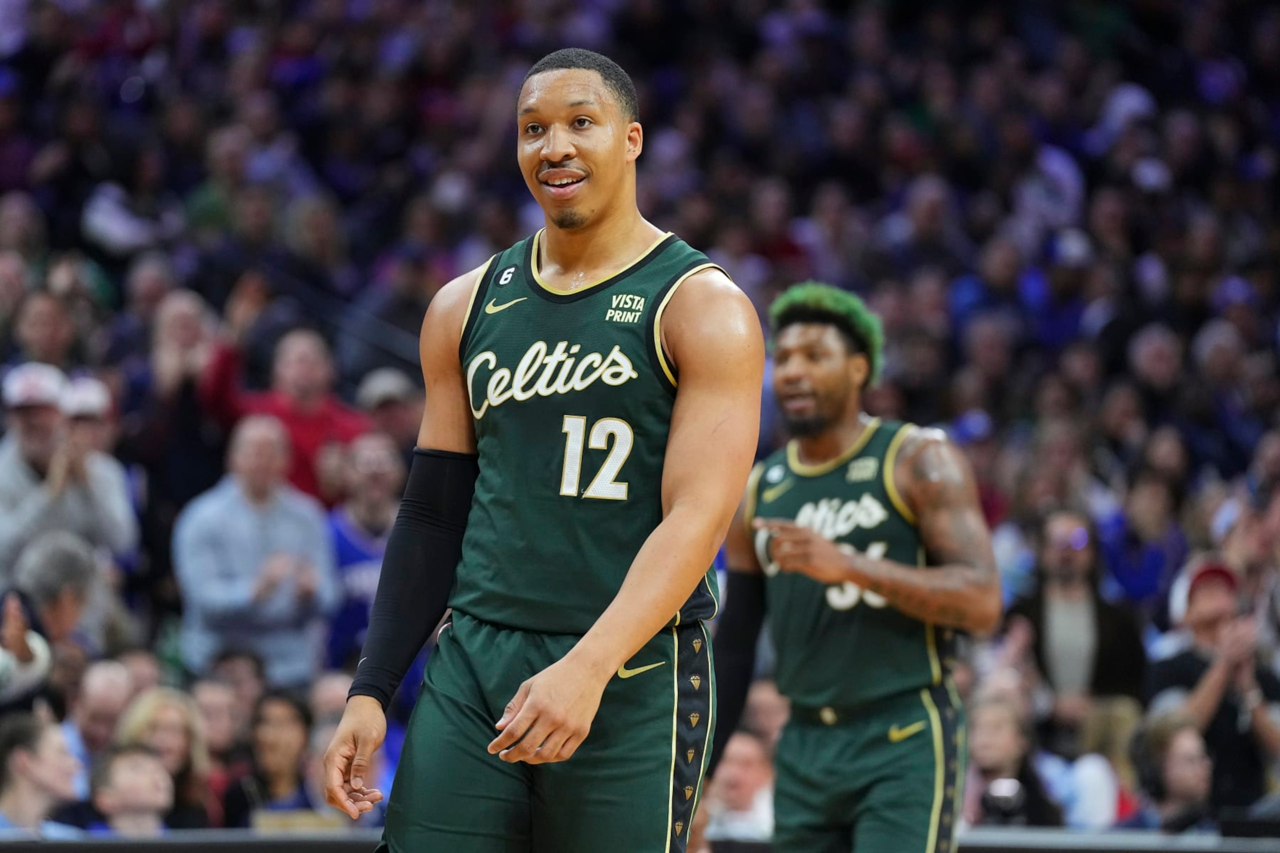 PHILADELPHIA, PA - FEBRUARY 25: Grant Williams #12 of the Boston Celtics reacts against the Philadelphia 76ers at the Wells Fargo Center on February 25, 2023 in Philadelphia, Pennsylvania. The Celtics defeated the 76ers 110-107. NOTE TO USER: User expressly acknowledges and agrees that, by downloading and or using this photograph, User is consenting to the terms and conditions of the Getty Images License Agreement. (Photo by Mitchell Leff/Getty Images)