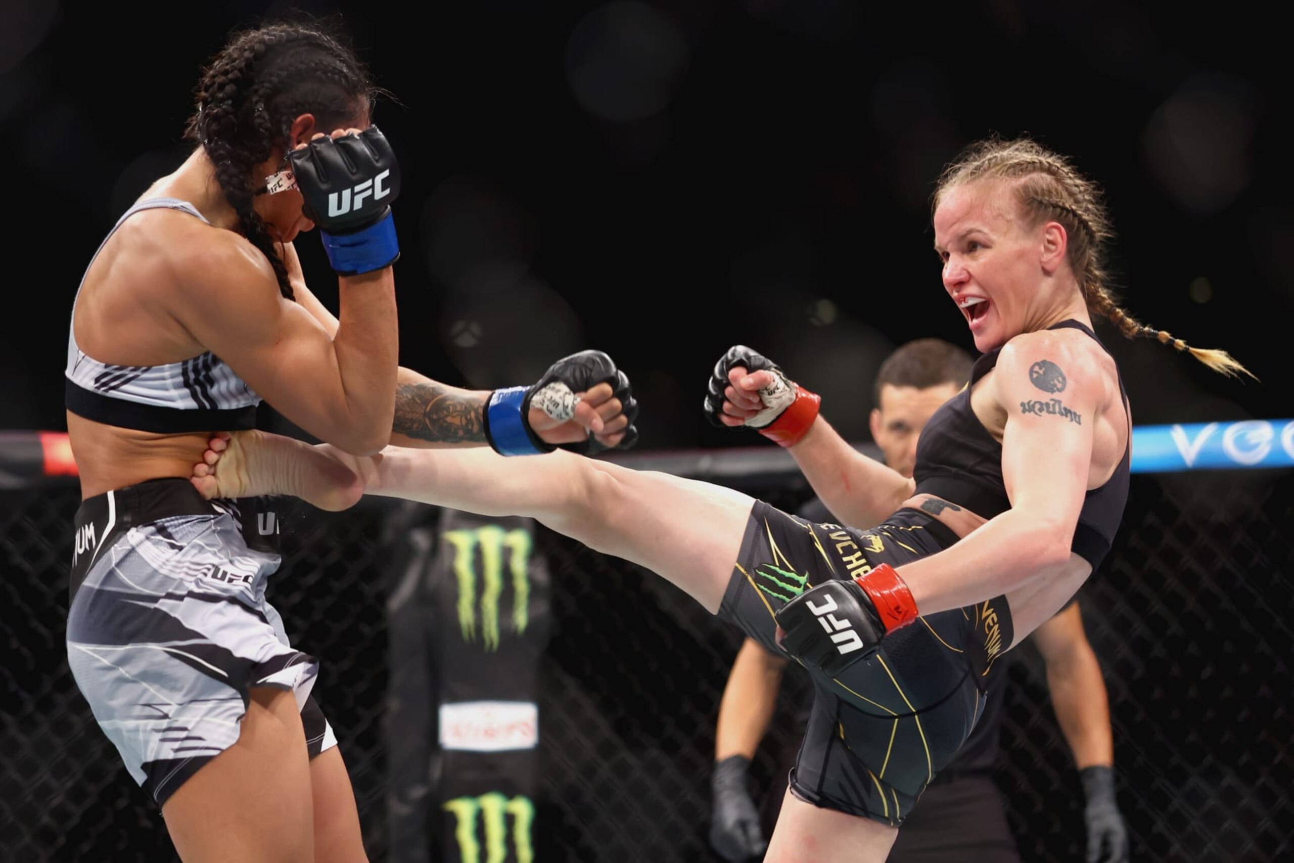 Valentina Shevchenko lands a kick against Taila Santos.