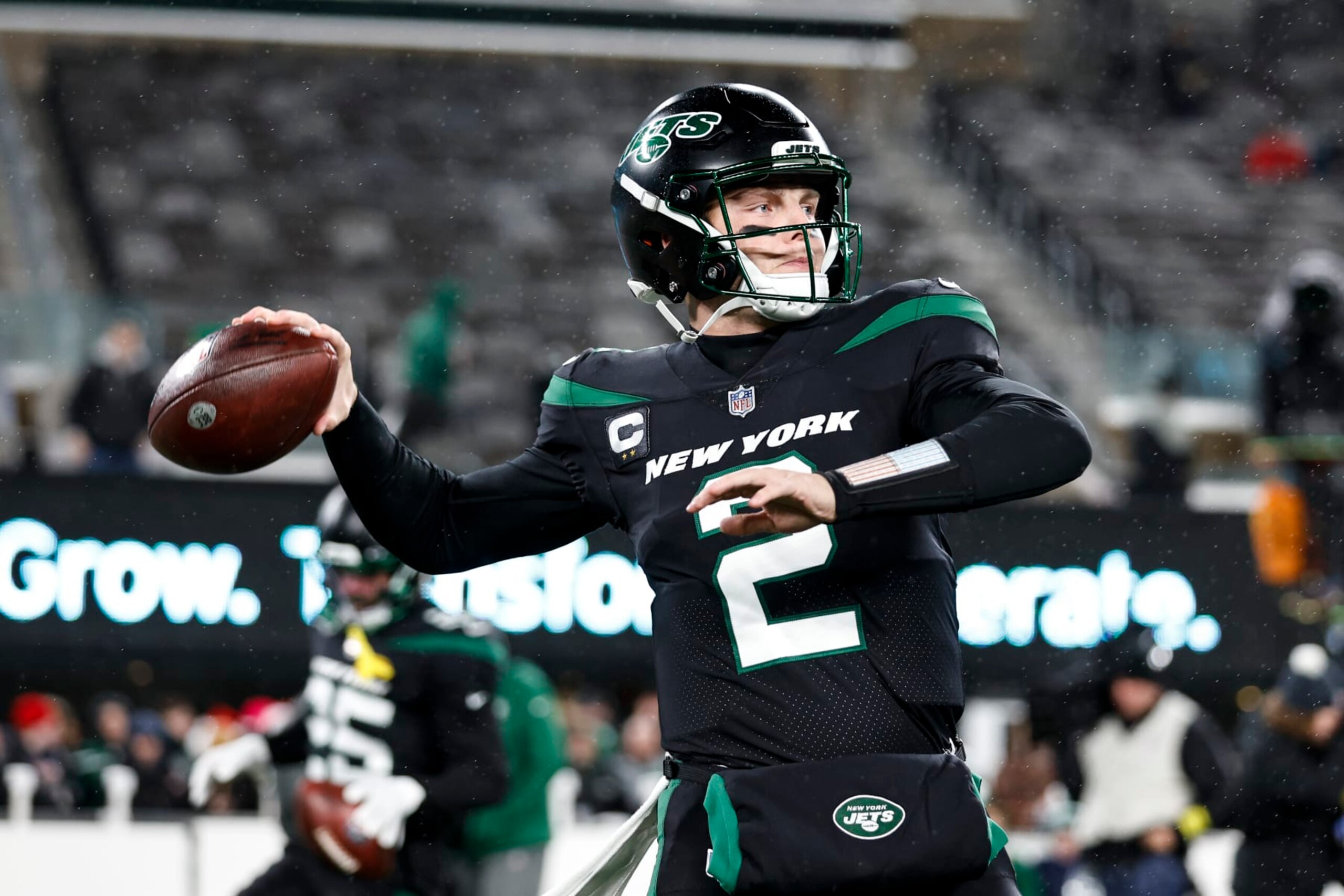 EAST RUTHERFORD, NEW JERSEY - DECEMBER 22: Zach Wilson #2 of the New York Jets passes as he warms up prior to an NFL football game between the New York Jets and the Jacksonville Jaguars at MetLife Stadium on December 22, 2022 in East Rutherford, New Jersey. (Photo by Michael Owens/Getty Images)