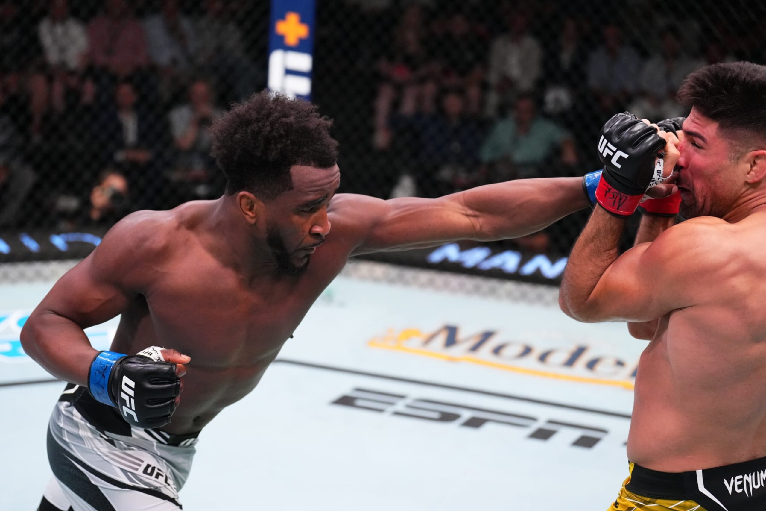Geoff Neal lands a punch against Vicente Luque.