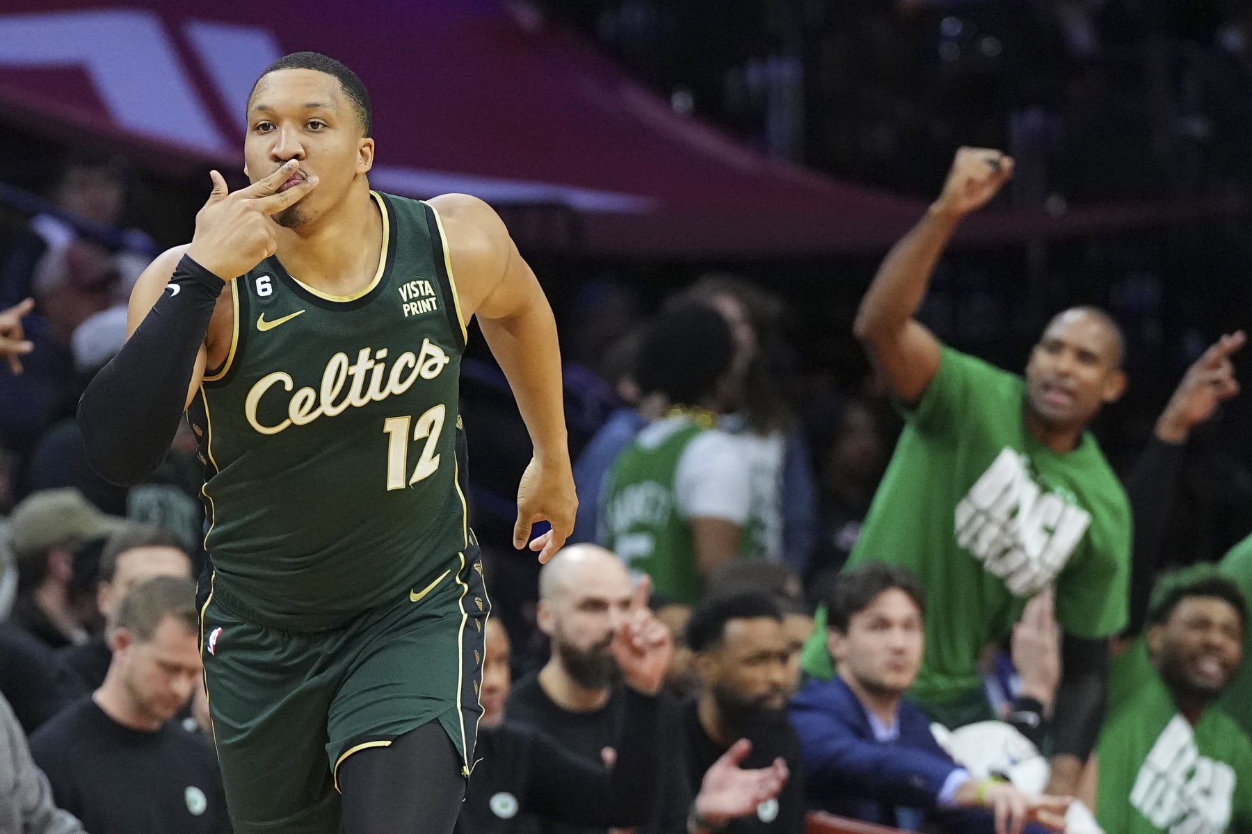 PHILADELPHIA, PA - FEBRUARY 25: Grant Williams #12 of the Boston Celtics reacts after making a three point basket against the Philadelphia 76ers at the Wells Fargo Center on February 25, 2023 in Philadelphia, Pennsylvania. The Celtics defeated the 76ers 110-107. NOTE TO USER: User expressly acknowledges and agrees that, by downloading and or using this photograph, User is consenting to the terms and conditions of the Getty Images License Agreement. (Photo by Mitchell Leff/Getty Images)