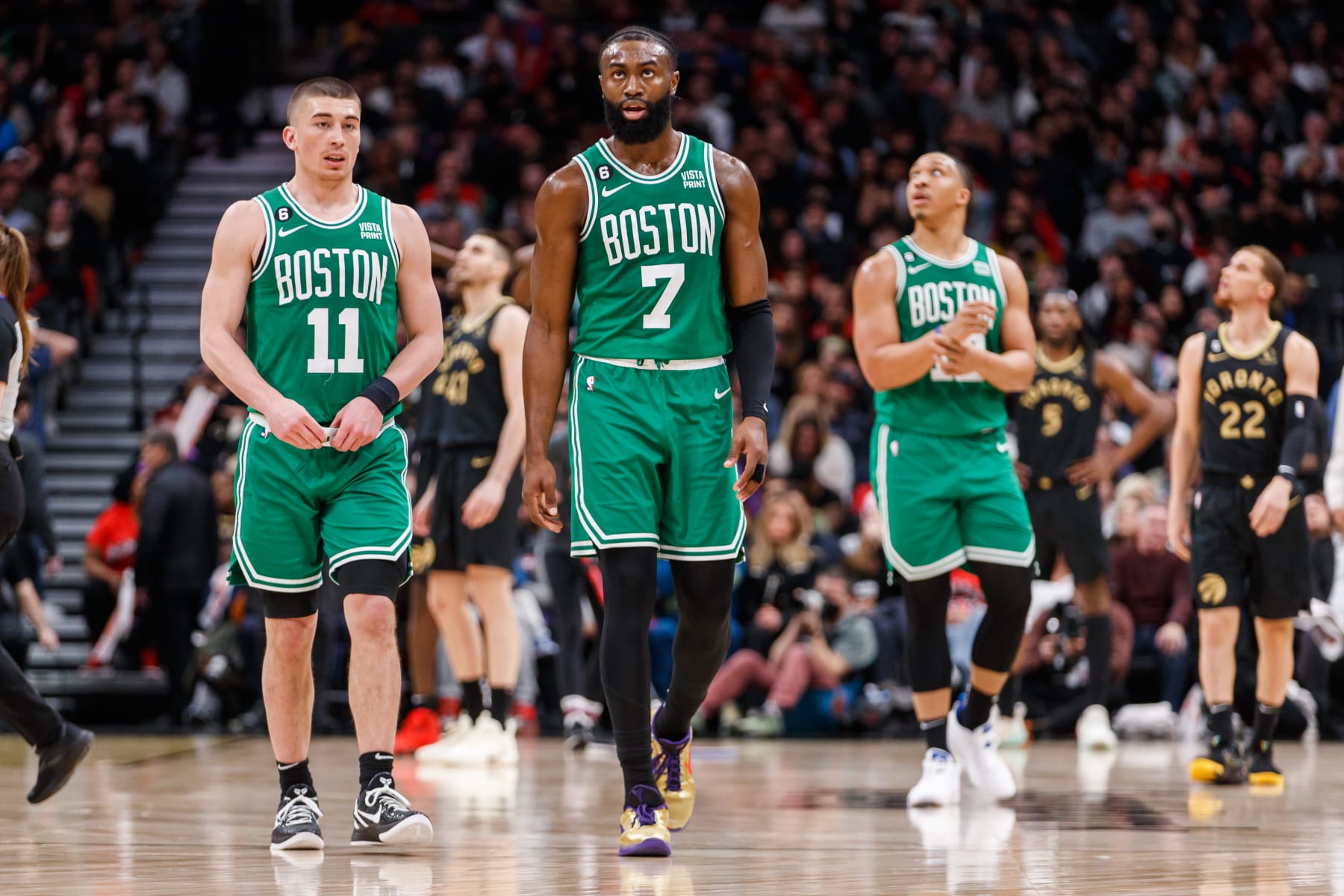TORONTO, ON - JANUARY 21: Jaylen Brown #7 of the Boston Celtics walks the floor alongside Payton Pritchard #11 during the first half of their NBA game against the Toronto Raptors at Scotiabank Arena on January 21, 2023 in Toronto, Canada. NOTE TO USER: User expressly acknowledges and agrees that, by downloading and or using this photograph, User is consenting to the terms and conditions of the Getty Images License Agreement. (Photo by Cole Burston/Getty Images)