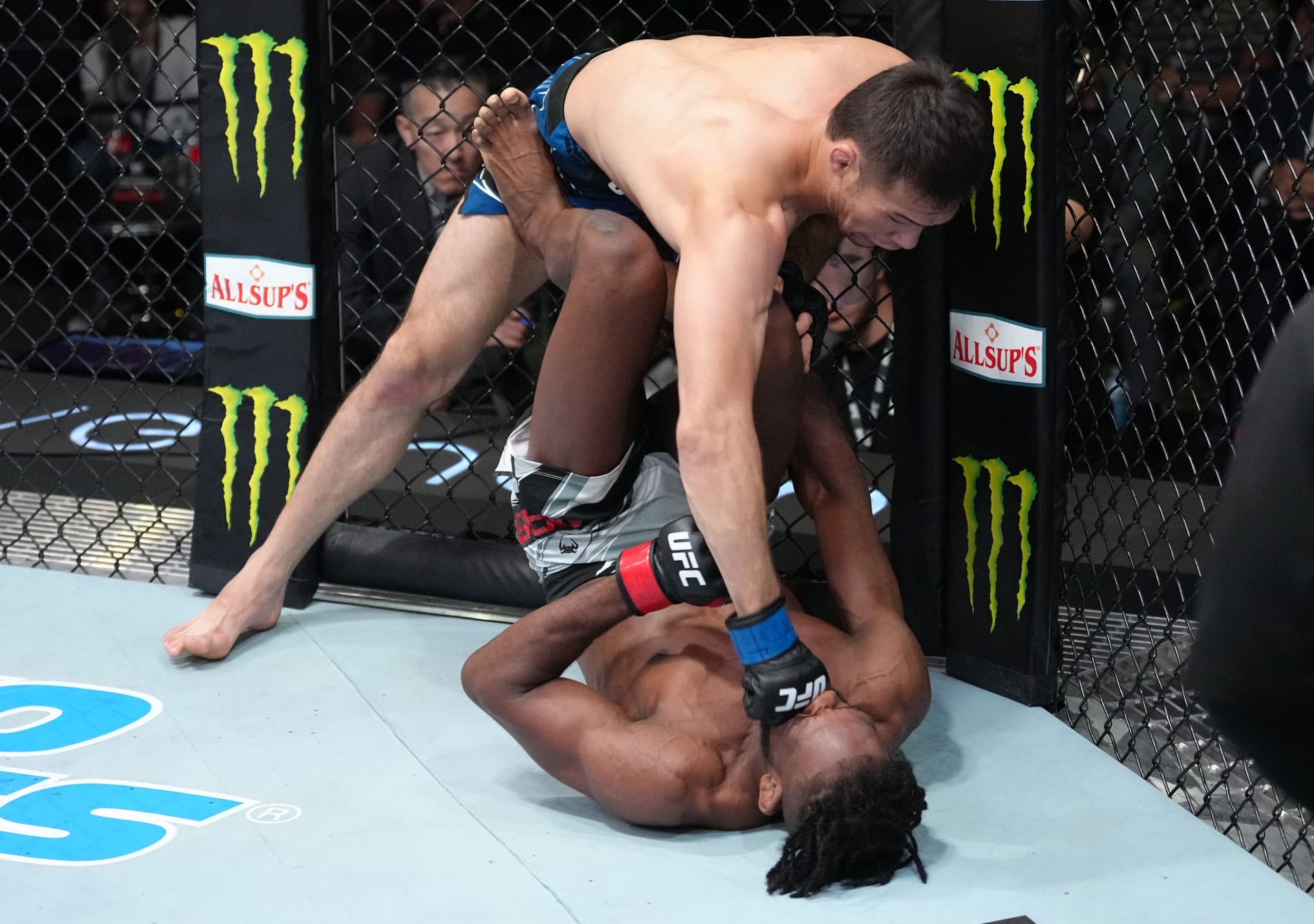 Shavkat Rakhmonov punches Neil Magny