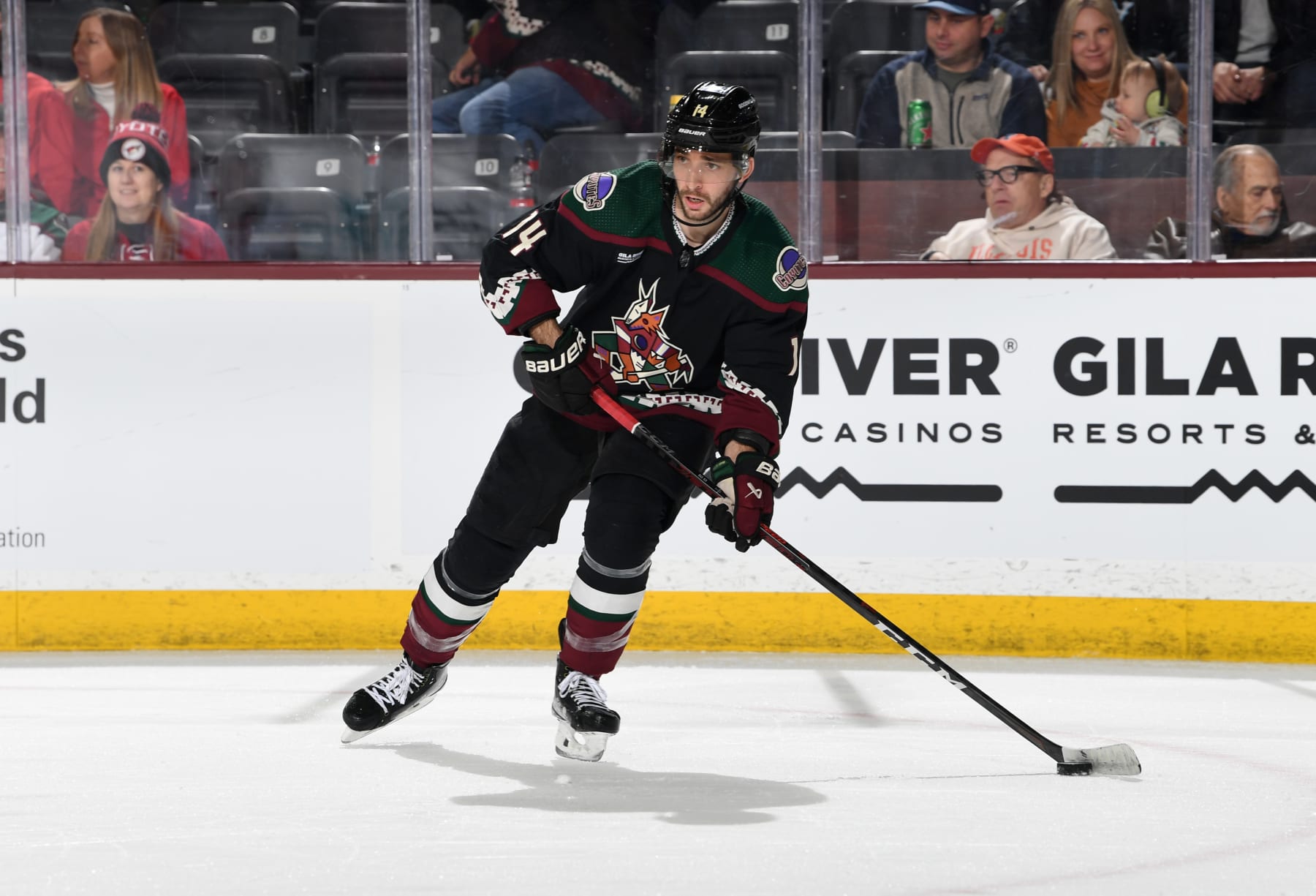 TEMPE, ARIZONA - JANUARY 17: Shayne Gostisbehere #14 of the Arizona Coyotes skates with the puck against the Detroit Red Wings at Mullett Arena on January 17, 2023 in Tempe, Arizona. (Photo by Norm Hall/NHLI via Getty Images)