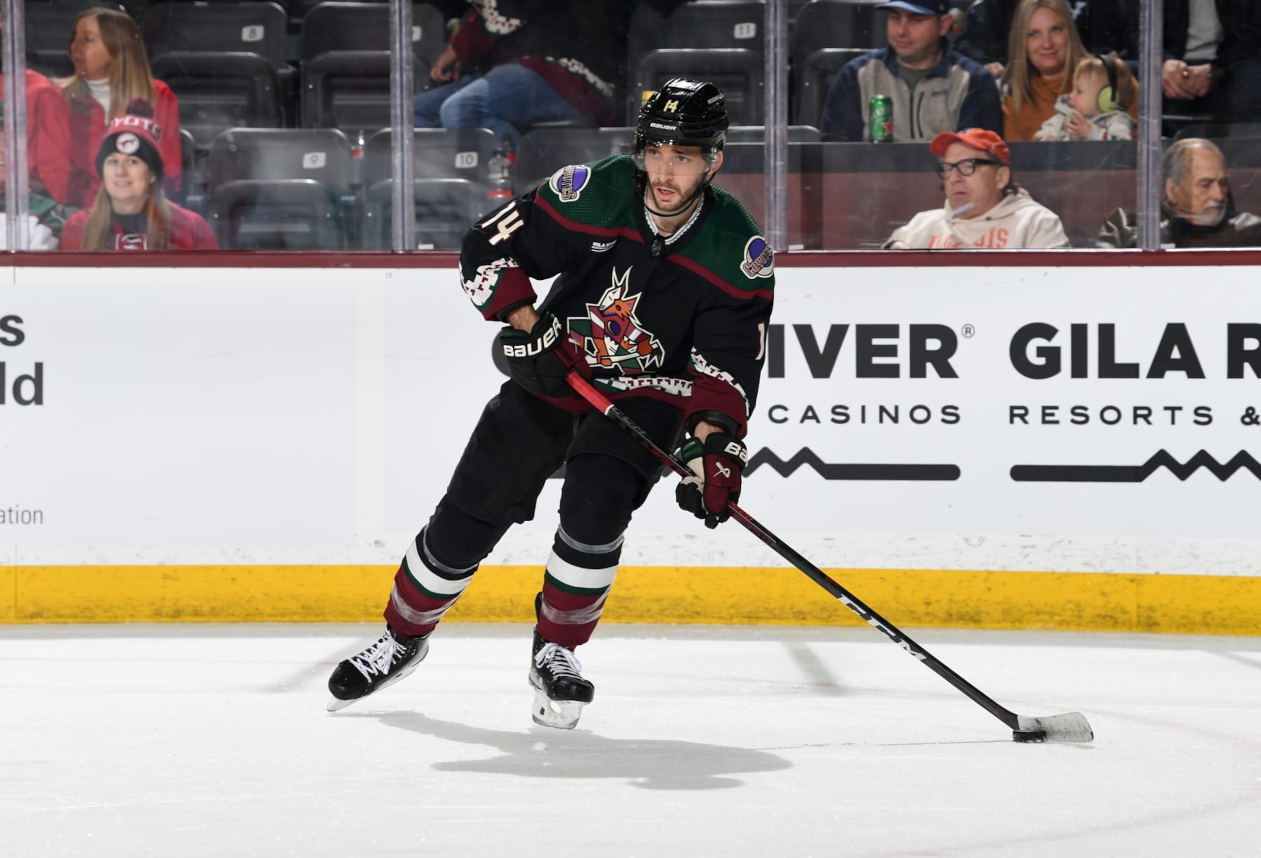 TEMPE, ARIZONA - JANUARY 17: Shayne Gostisbehere #14 of the Arizona Coyotes skates with the puck against the Detroit Red Wings at Mullett Arena on January 17, 2023 in Tempe, Arizona. (Photo by Norm Hall/NHLI via Getty Images)