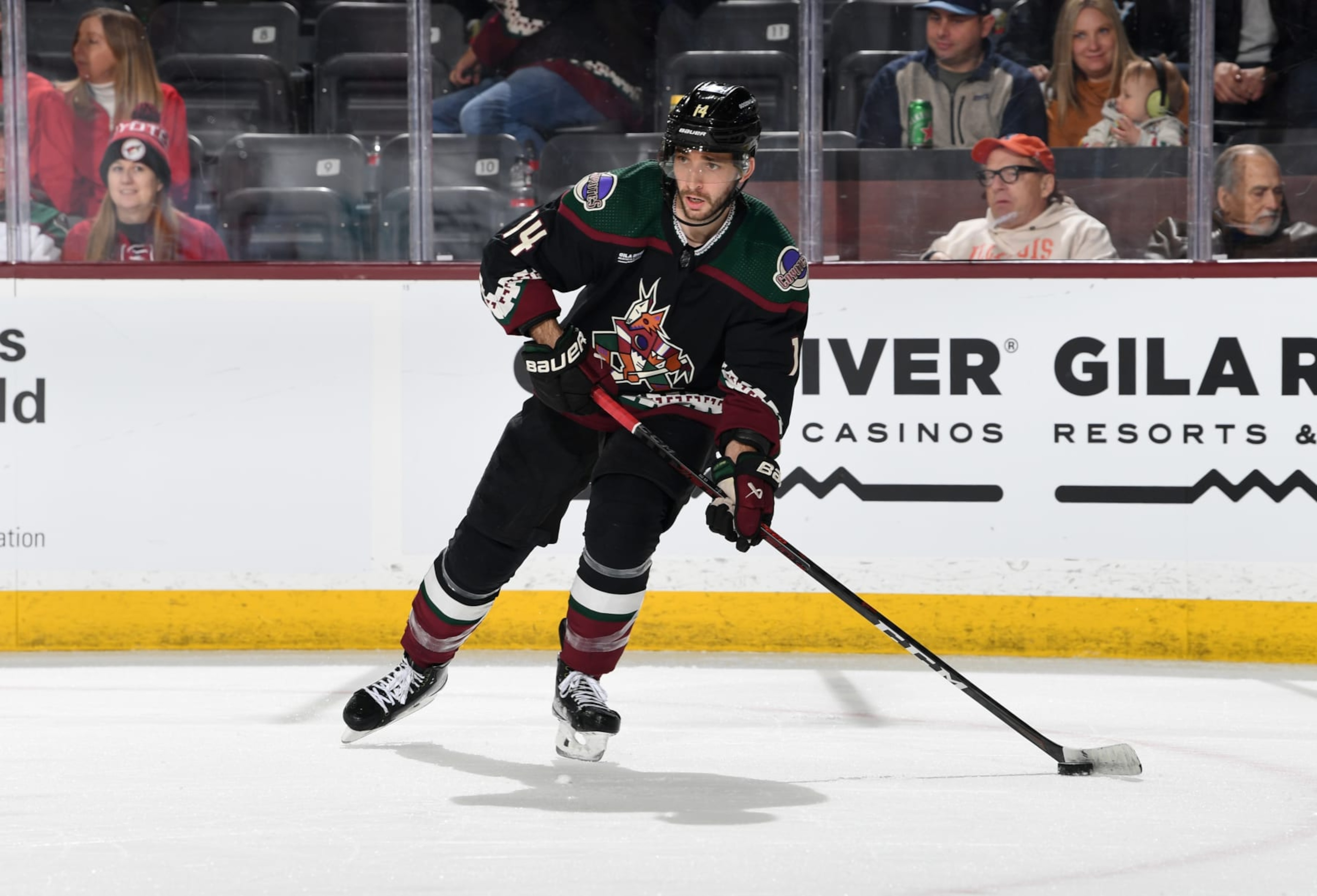 TEMPE, ARIZONA - JANUARY 17: Shayne Gostisbehere #14 of the Arizona Coyotes skates with the puck against the Detroit Red Wings at Mullett Arena on January 17, 2023 in Tempe, Arizona. (Photo by Norm Hall/NHLI via Getty Images) TEMPE, ARIZONA - JANUARY 17: Shayne Gostisbehere #14 of the Arizona Coyotes skates with the puck against the Detroit Red Wings at Mullett Arena on January 17, 2023 in Tempe, Arizona. (Photo by Norm Hall/NHLI via Getty Images)