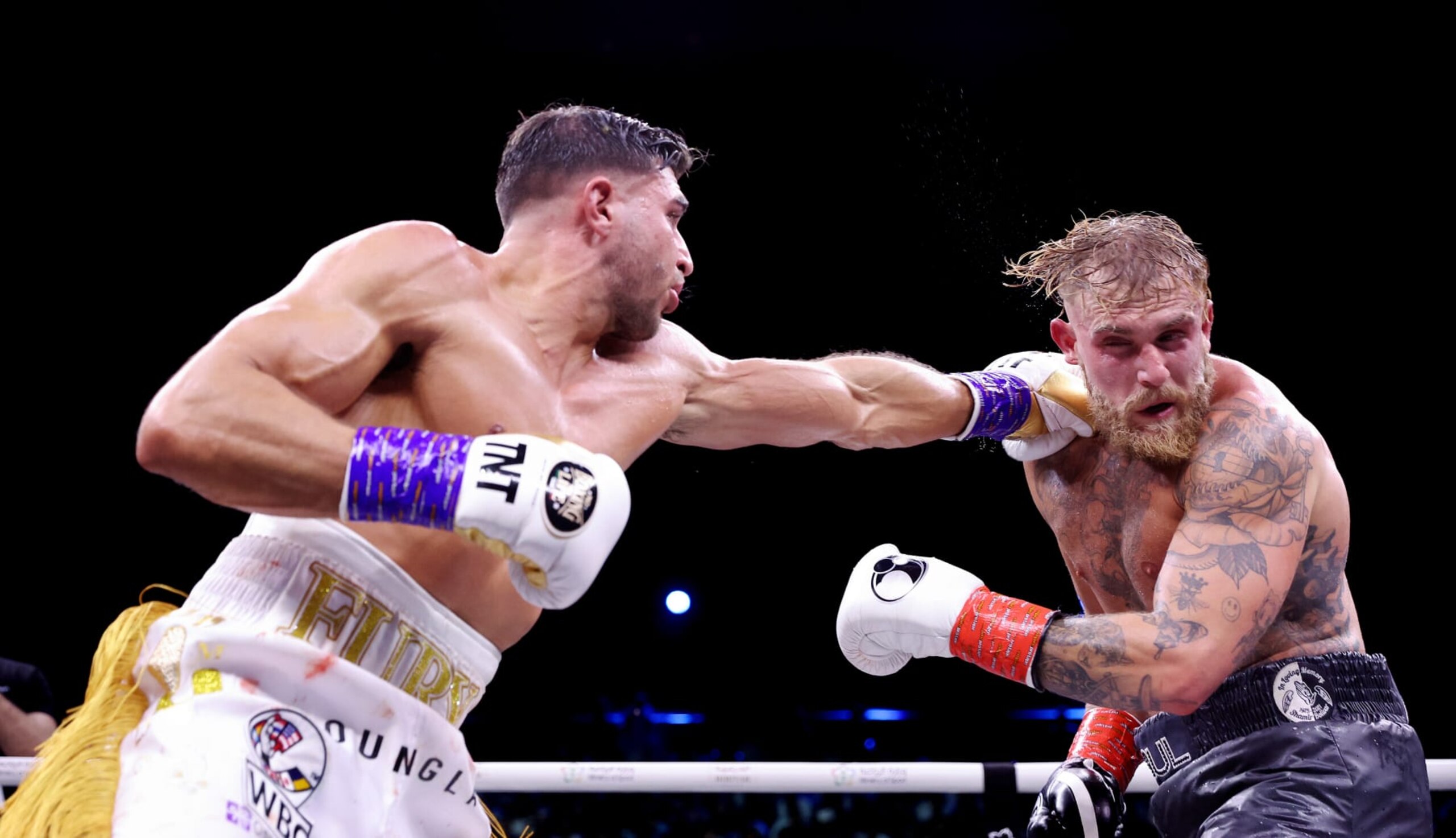 RIYADH, SAUDI ARABIA - FEBRUARY 26: Tommy Fury punches Jake Paul during the Cruiserweight Title fight between Jake Paul and Tommy Fury at the Diriyah Arena on February 26, 2023 in Riyadh, Saudi Arabia. (Photo by Francois Nel/Getty Images) RIYADH, SAUDI ARABIA - FEBRUARY 26: Tommy Fury punches Jake Paul during the Cruiserweight Title fight between Jake Paul and Tommy Fury at the Diriyah Arena on February 26, 2023 in Riyadh, Saudi Arabia. (Photo by Francois Nel/Getty Images)