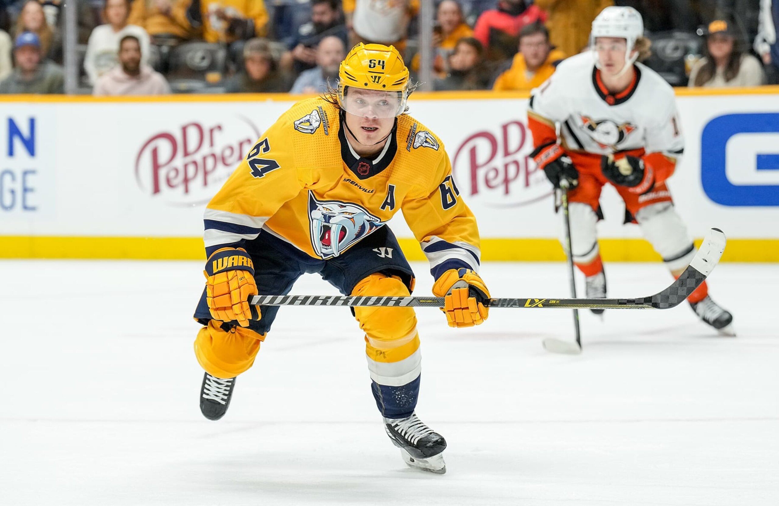 NASHVILLE, TENNESSEE - NOVEMBER 29: Mikael Granlund #64 of the Nashville Predators skates against the Anaheim Ducks during an NHL game at Bridgestone Arena on November 29, 2022 in Nashville, Tennessee. (Photo by John Russell/NHLI via Getty Images)