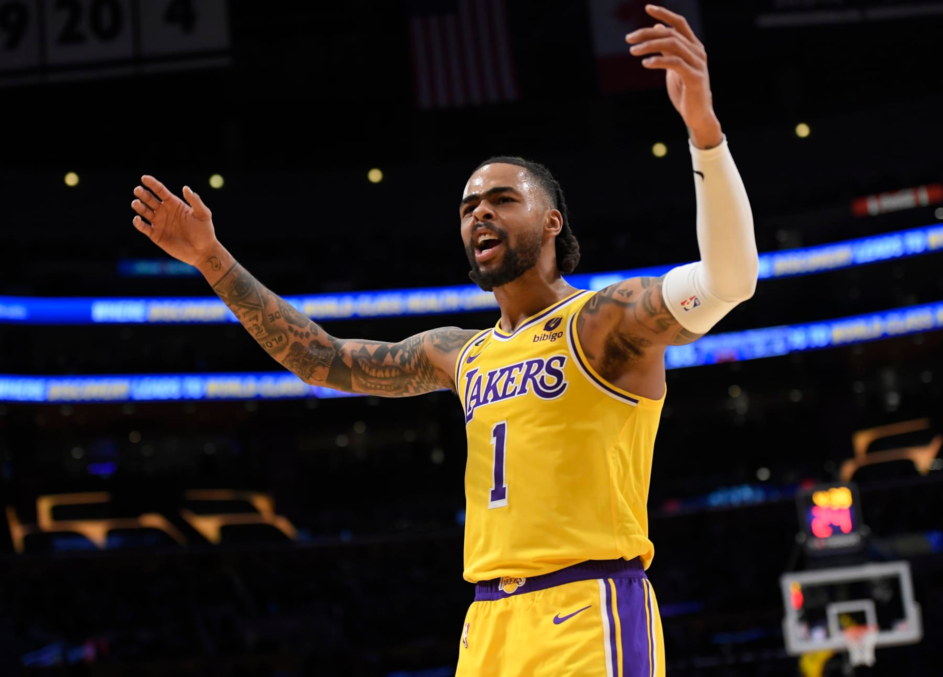 LOS ANGELES, CA - FEBRUARY 15: D'Angelo Russell #1 of the Los Angeles Lakers celebrates a basket and foul of LeBron James #6 against the New Orleans Pelicans during the second half at Crypto.com Arena on February 15, 2023 in Los Angeles, California. On his home debut Russell scored 21 points to defeat the New Orleans Pelicans, 120-102. NOTE TO USER: User expressly acknowledges and agrees that, by downloading and or using this photograph, User is consenting to the terms and conditions of the Getty Images License Agreement. (Photo by Kevork Djansezian/Getty Images)