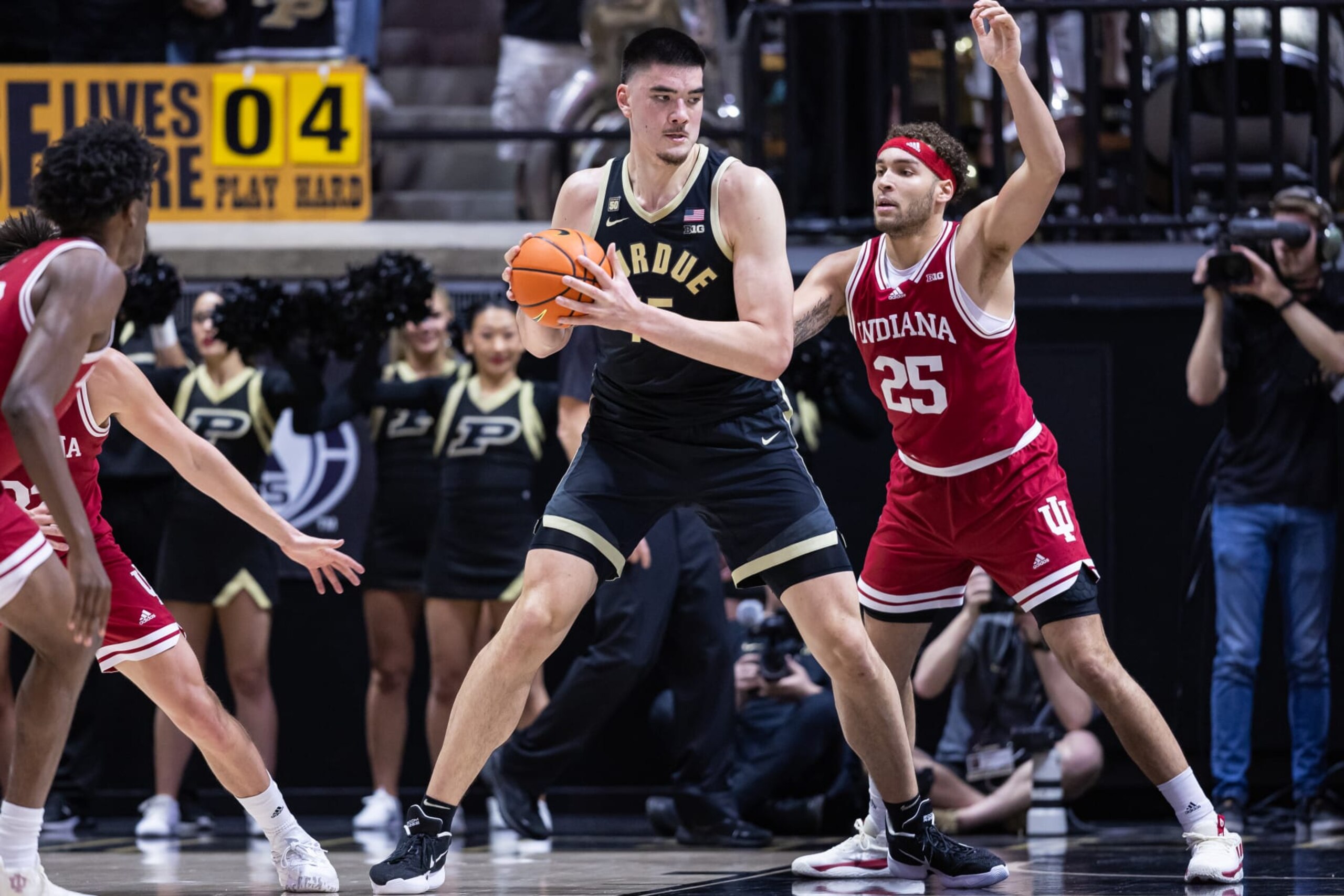 WEST LAFAYETTE, IN - FEBRUARY 25: Zach Edey #15 of the Purdue Boilermakers holds the ball against Race Thompson #25 of the Indiana Hoosiers at Mackey Arena on February 25, 2023 in West Lafayette, Indiana. (Photo by Michael Hickey/Getty Images)