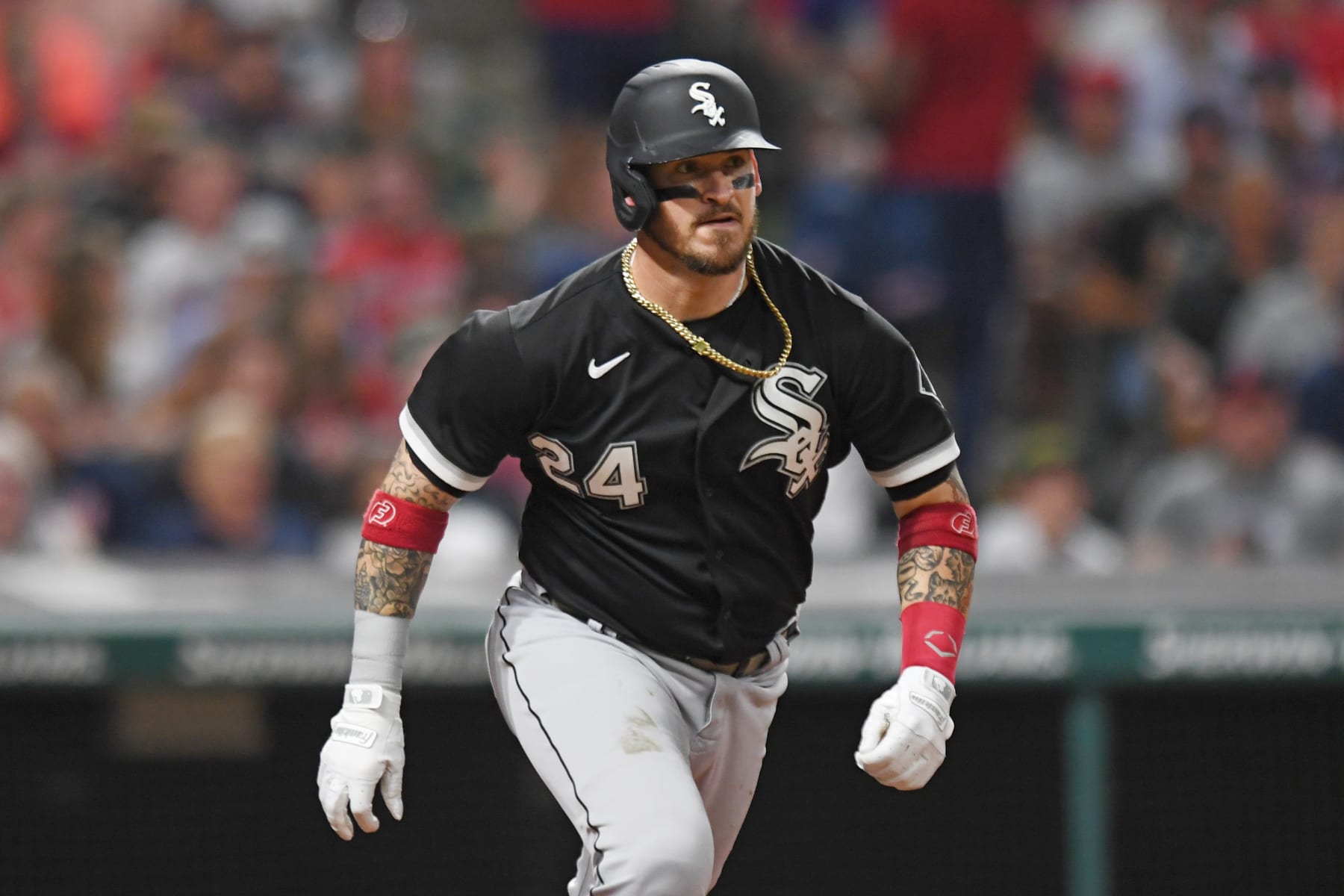 CLEVELAND, OH - AUGUST 19, 2022: Yasmani Grandal #24 of the Chicago White Sox runs out a ground ball during the seventh inning against the Cleveland Guardians at Progressive Field on August 19, 2022 in Cleveland, Ohio. (Photo by George Kubas/Diamond Images via Getty Images)
