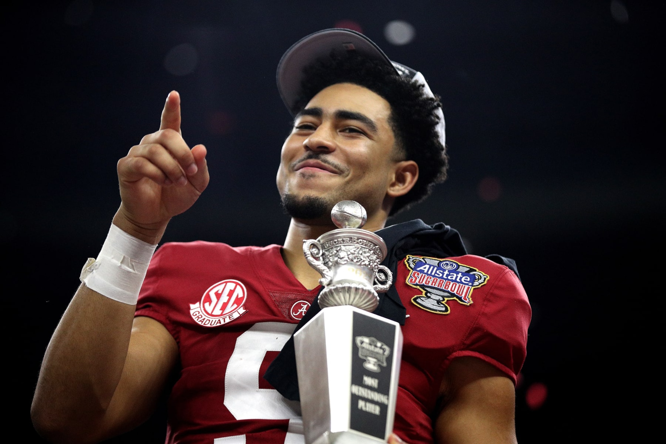 NEW ORLEANS, LOUISIANA - DECEMBER 31: Bryce Young #9 of the Alabama Crimson Tide celebrates after recieving MVP award during of the Allstate Sugar Bowl against the Kansas State Wildcats at Caesars Superdome on December 31, 2022 in New Orleans, Louisiana. Alabama Crimson Tide won the game 45 - 20. (Photo by Sean Gardner/Getty Images)