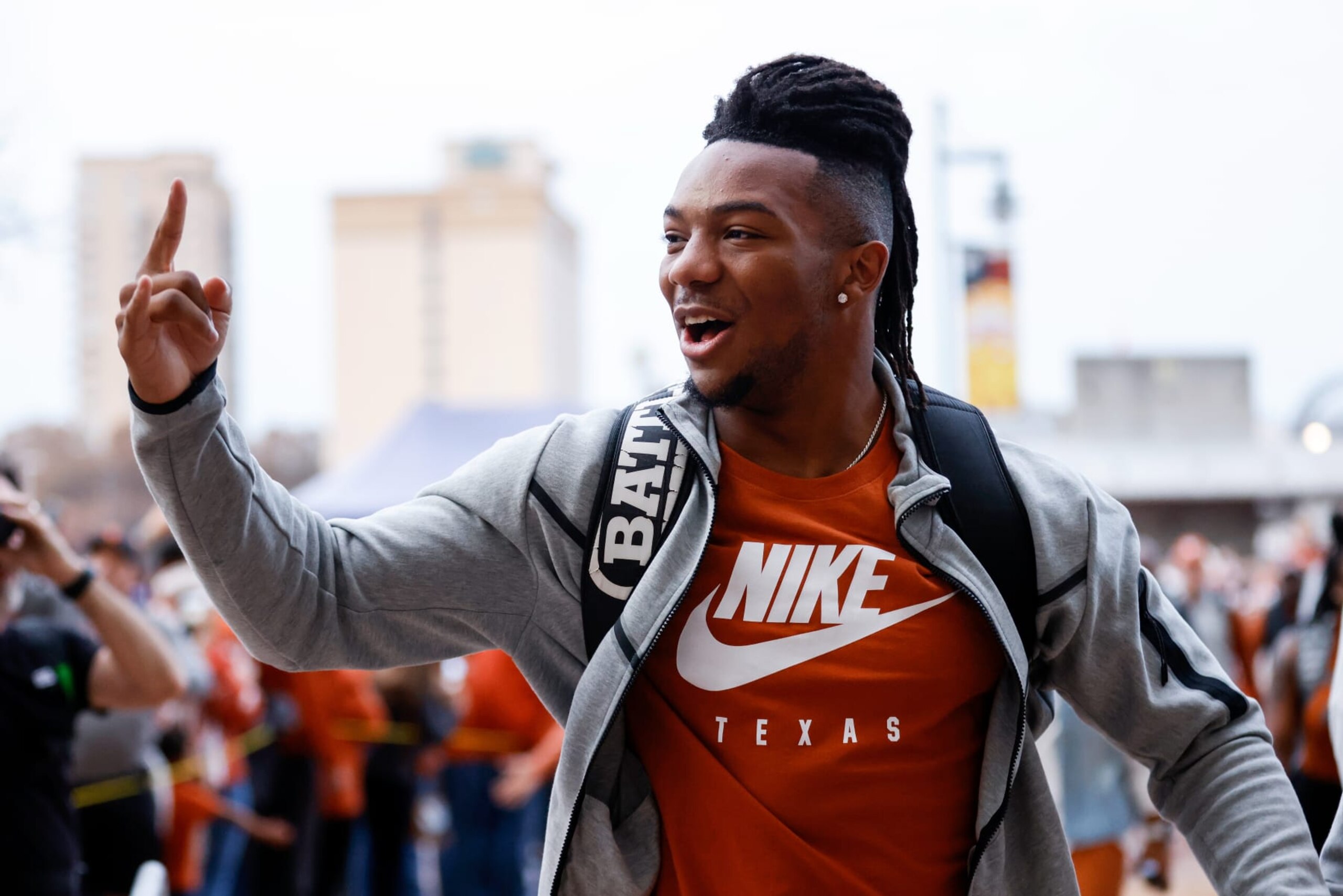 SAN ANTONIO, TEXAS - DECEMBER 29: Bijan Robinson #5 of the Texas Longhorns arrives to the stadium before the Valero Alamo Bowl against the Washington Huskies at Alamodome on December 29, 2022 in San Antonio, Texas. (Photo by Tim Warner/Getty Images)
