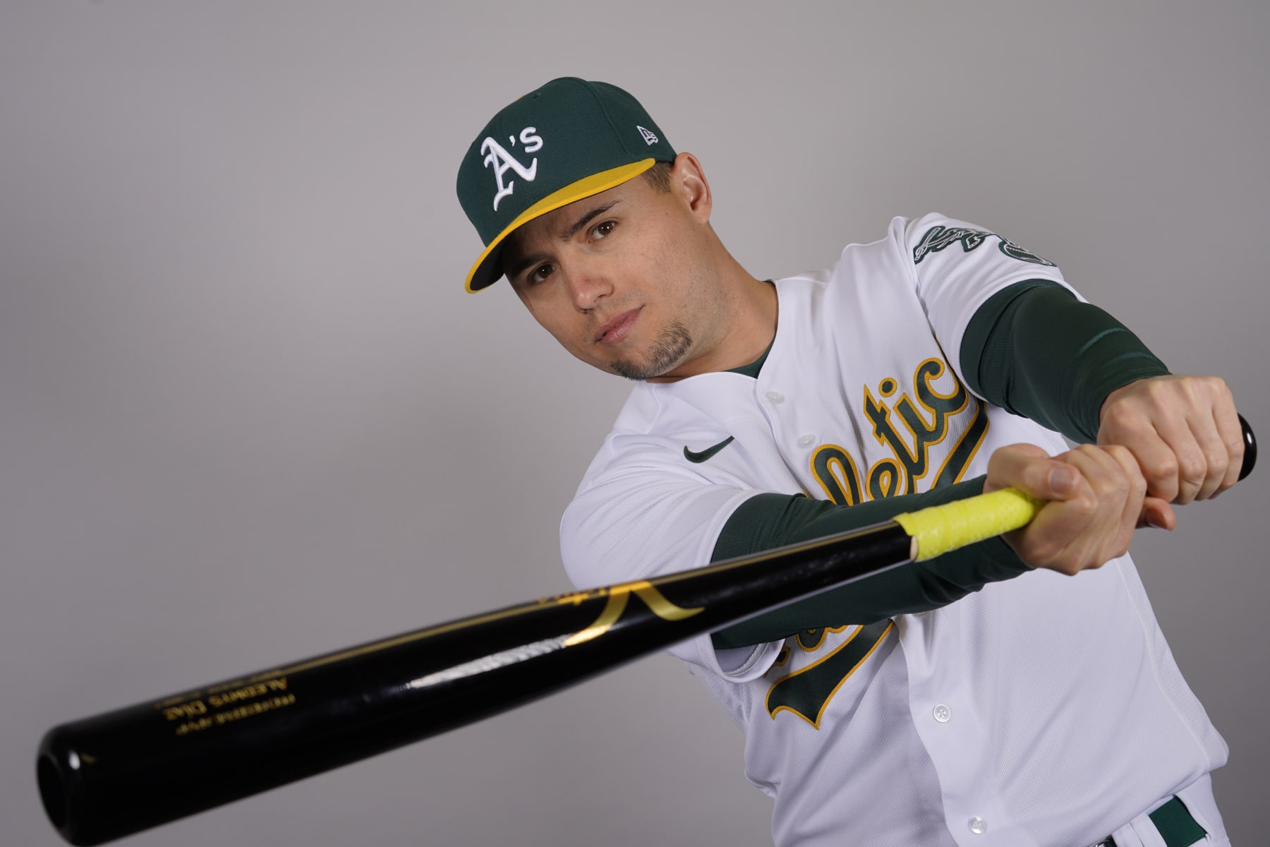 This is a 2023 photo of left fielder Aledmys Diaz (12) of the Oakland Athletics baseball team. This image reflects the Oakland Athletics active roster as of Thursday, Feb. 23, 2023, when this image was taken in Mesa, Ariz. (AP Photo/Matt York)