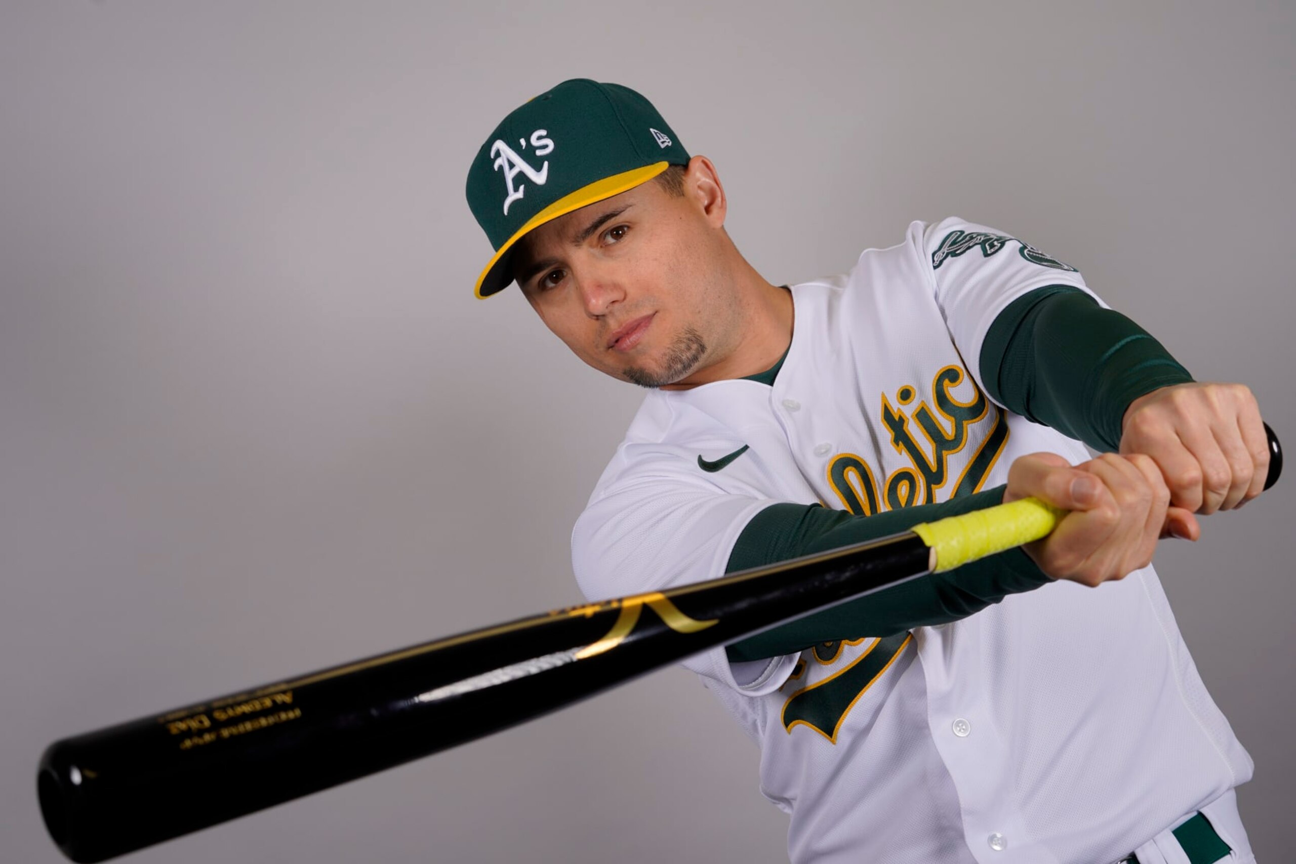 This is a 2023 photo of left fielder Aledmys Diaz (12) of the Oakland Athletics baseball team. This image reflects the Oakland Athletics active roster as of Thursday, Feb. 23, 2023, when this image was taken in Mesa, Ariz. (AP Photo/Matt York)