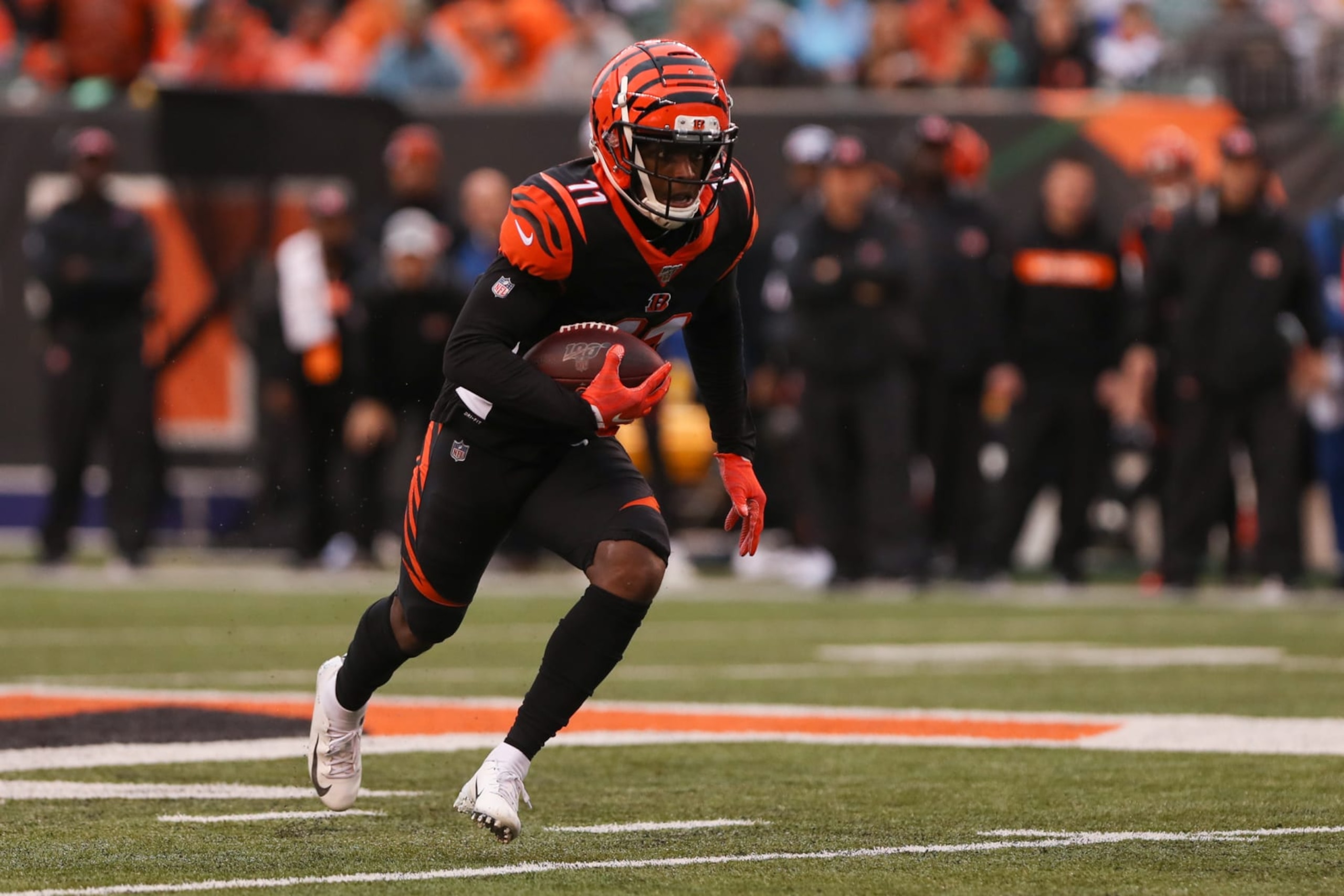 CINCINNATI, OH - DECEMBER 29: Cincinnati Bengals wide receiver John Ross (11) carries the ball during the game against the Cleveland Browns and the Cincinnati Bengals on December 29th 2019, at Paul Brown Stadium in Cincinnati, OH. (Photo by Ian Johnson/Icon Sportswire via Getty Images)