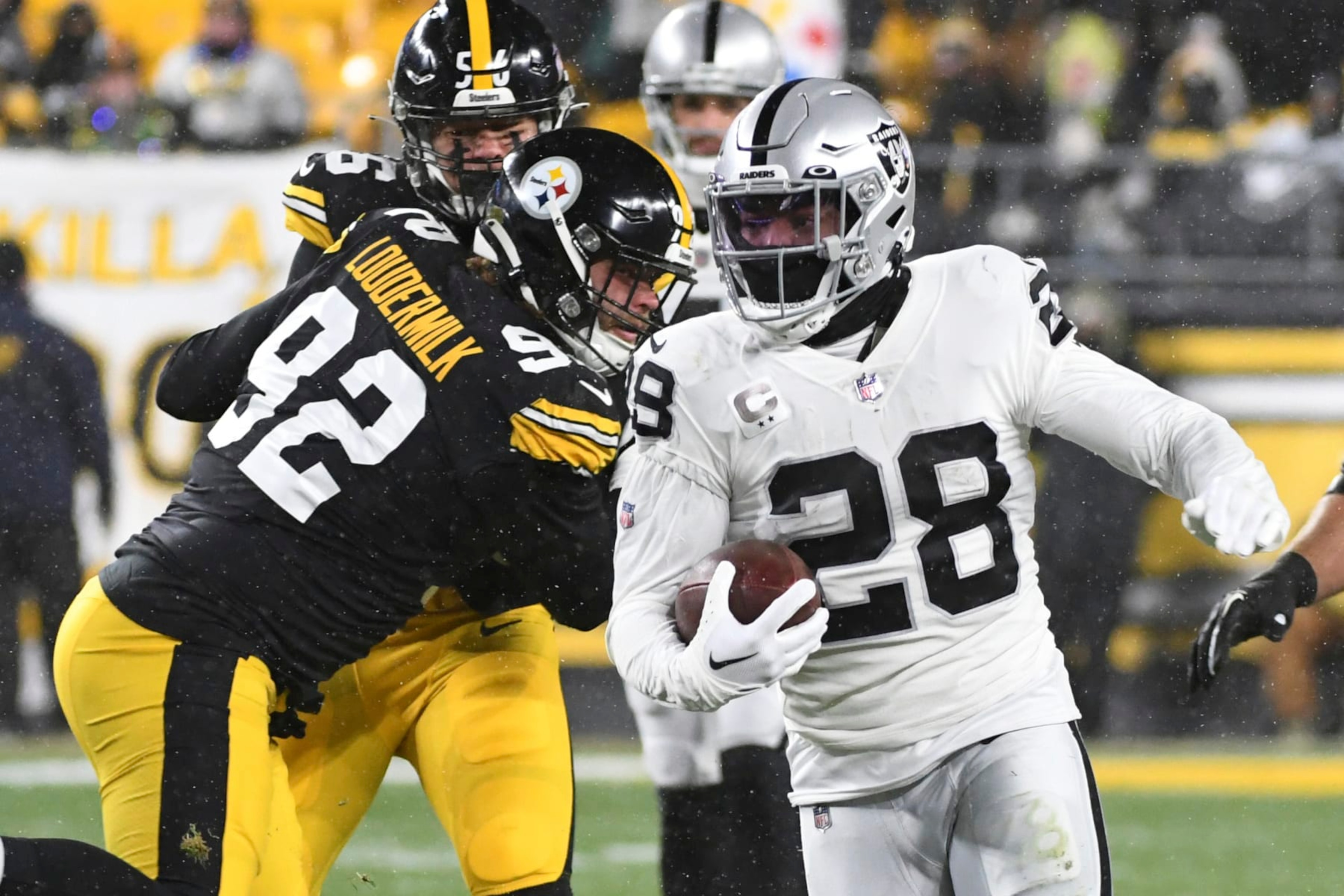 Las Vegas Raiders running back Josh Jacobs (28) carries the ball during the first half of an NFL football game against the Pittsburgh Steelers in Pittsburgh, Saturday, Dec. 24, 2022. (AP Photo/Fred Vuich) Las Vegas Raiders running back Josh Jacobs (28) carries the ball during the first half of an NFL football game against the Pittsburgh Steelers in Pittsburgh, Saturday, Dec. 24, 2022. (AP Photo/Fred Vuich)