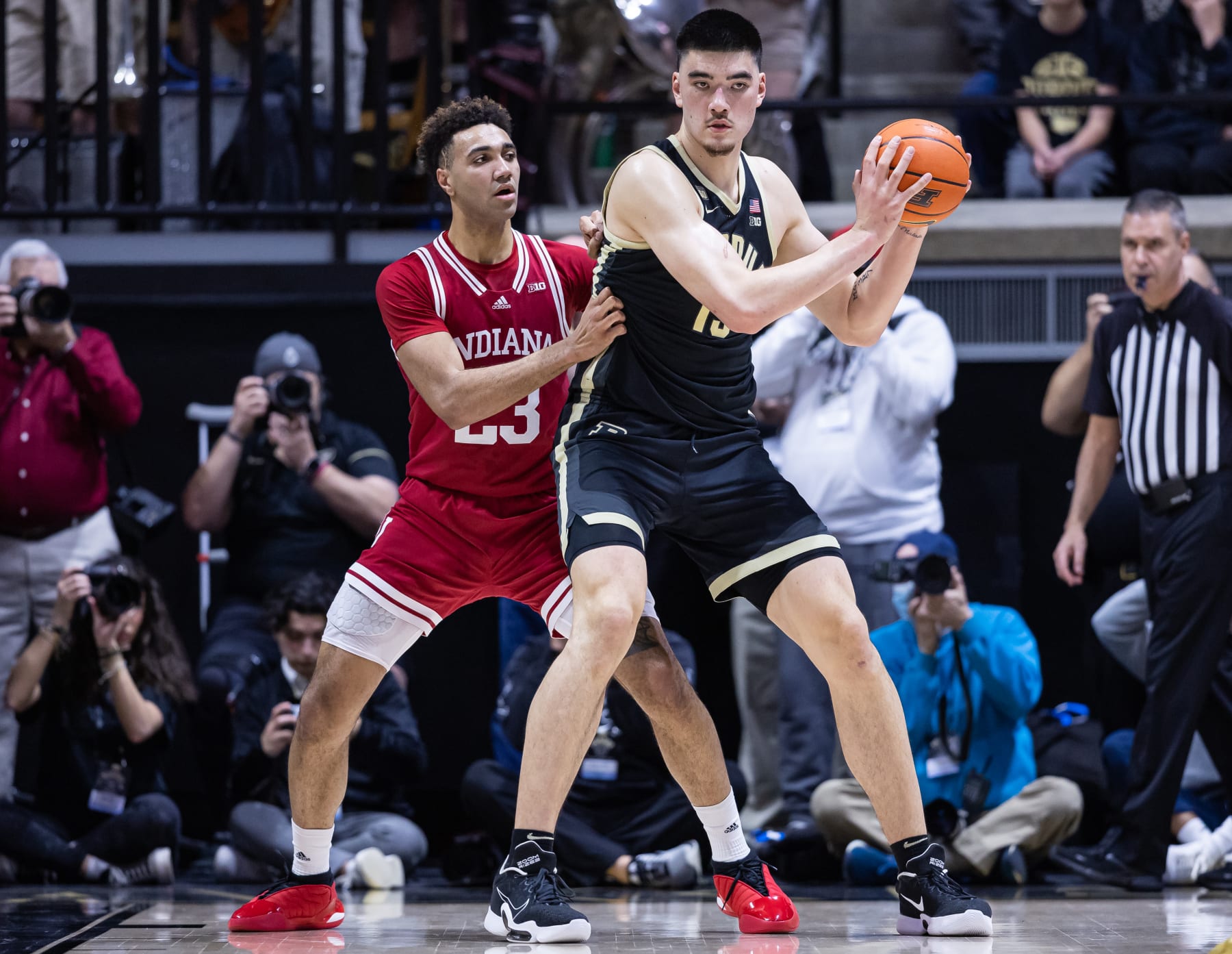 WEST LAFAYETTE, IN - FEBRUARY 25: Zach Edey #15 of the Purdue Boilermakers holds the ball against Trayce Jackson-Davis #23 of the Indiana Hoosiers at Mackey Arena on February 25, 2023 in West Lafayette, Indiana. (Photo by Michael Hickey/Getty Images)