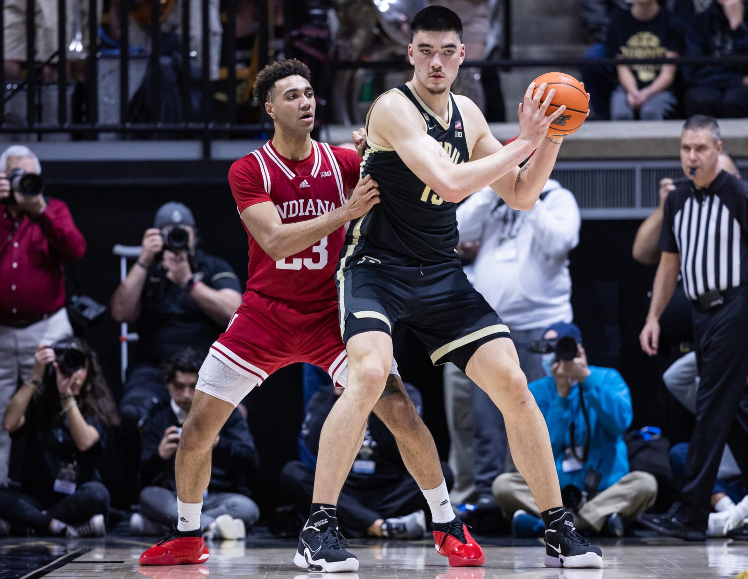 WEST LAFAYETTE, IN - FEBRUARY 25: Zach Edey #15 of the Purdue Boilermakers holds the ball against Trayce Jackson-Davis #23 of the Indiana Hoosiers at Mackey Arena on February 25, 2023 in West Lafayette, Indiana. (Photo by Michael Hickey/Getty Images)
