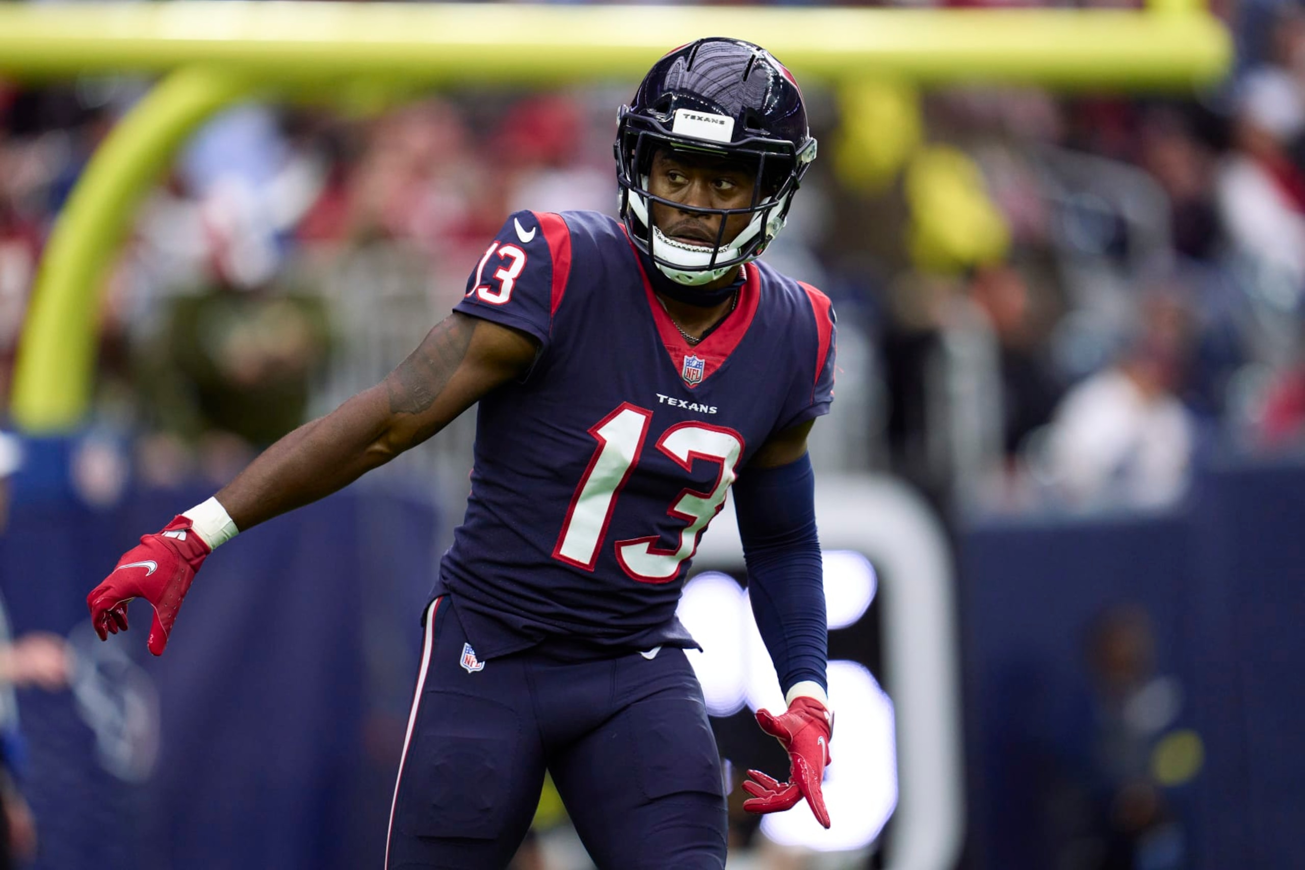 HOUSTON, TX - NOVEMBER 20: Brandin Cooks #13 of the Houston Texans lines up at the line of scrimmage against the Washington Commanders at NRG Stadium on November 20, 2022 in Houston, Texas. (Photo by Cooper Neill/Getty Images)
