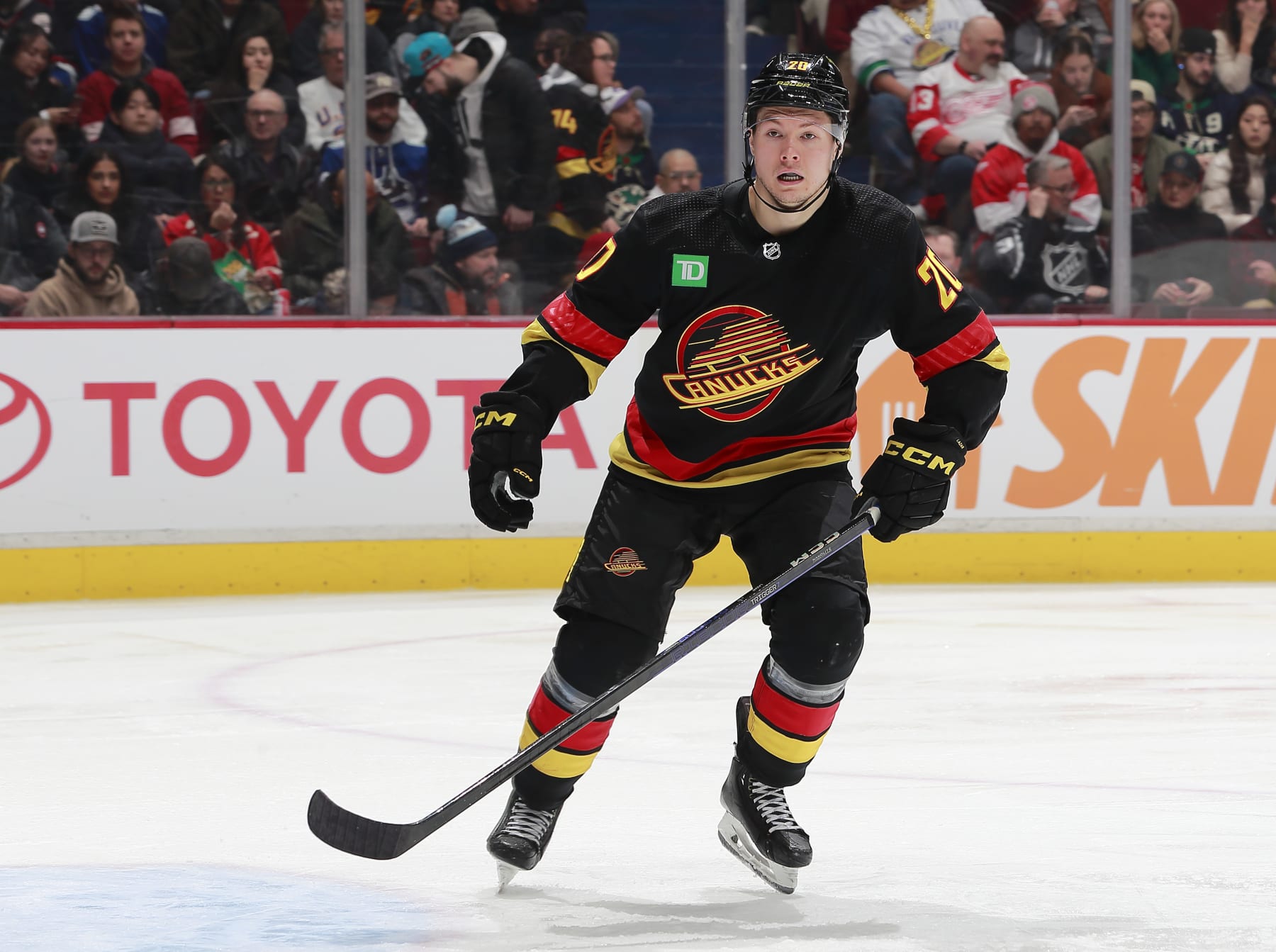 VANCOUVER, CANADA - FEBRUARY 13: Curtis Lazar #20 of the Vancouver Canucks skates up ice during their NHL game against the Detroit Red Wings at Rogers Arena February 13, 2023 in Vancouver, British Columbia, Canada.  (Photo by Jeff Vinnick/NHLI via Getty Images)