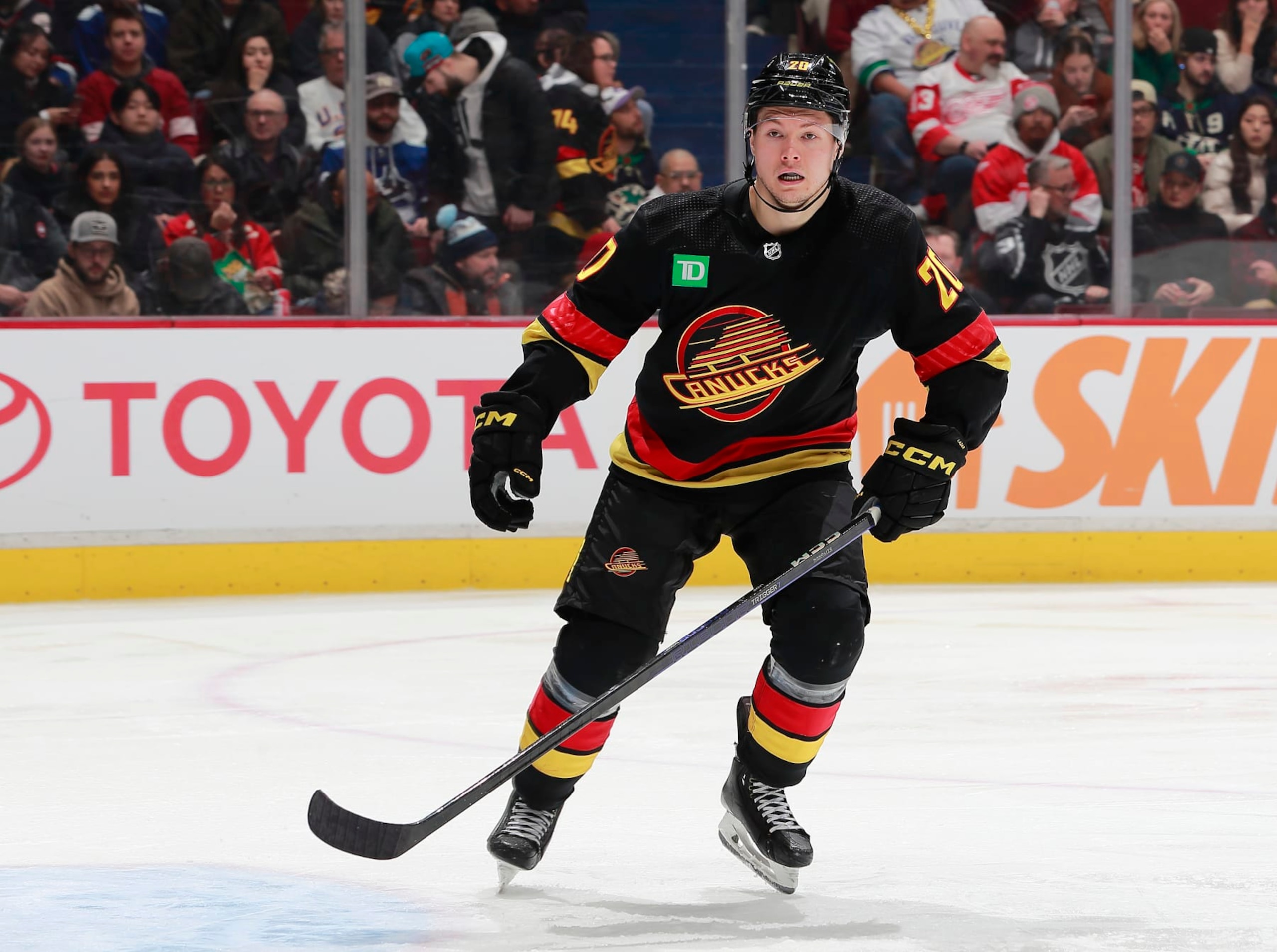 VANCOUVER, CANADA - FEBRUARY 13: Curtis Lazar #20 of the Vancouver Canucks skates up ice during their NHL game against the Detroit Red Wings at Rogers Arena February 13, 2023 in Vancouver, British Columbia, Canada.  (Photo by Jeff Vinnick/NHLI via Getty Images)